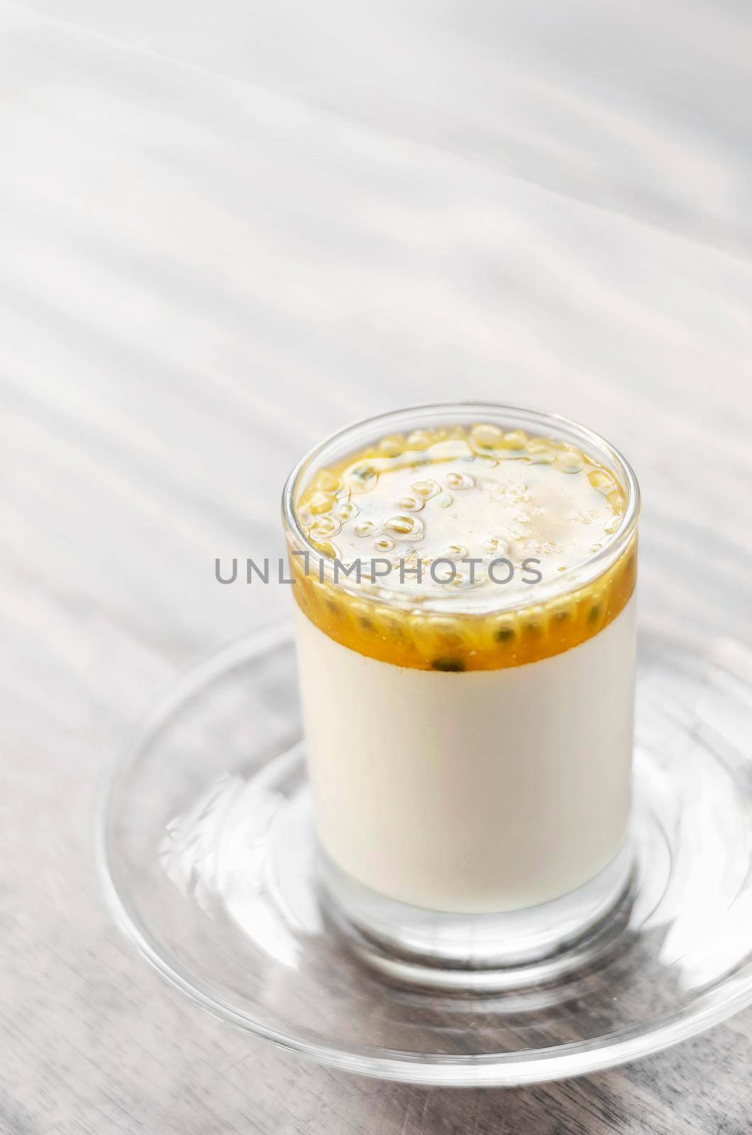 vegan dairy free organic coconut cream panna cotta with passion fruit dessert by jackmalipan