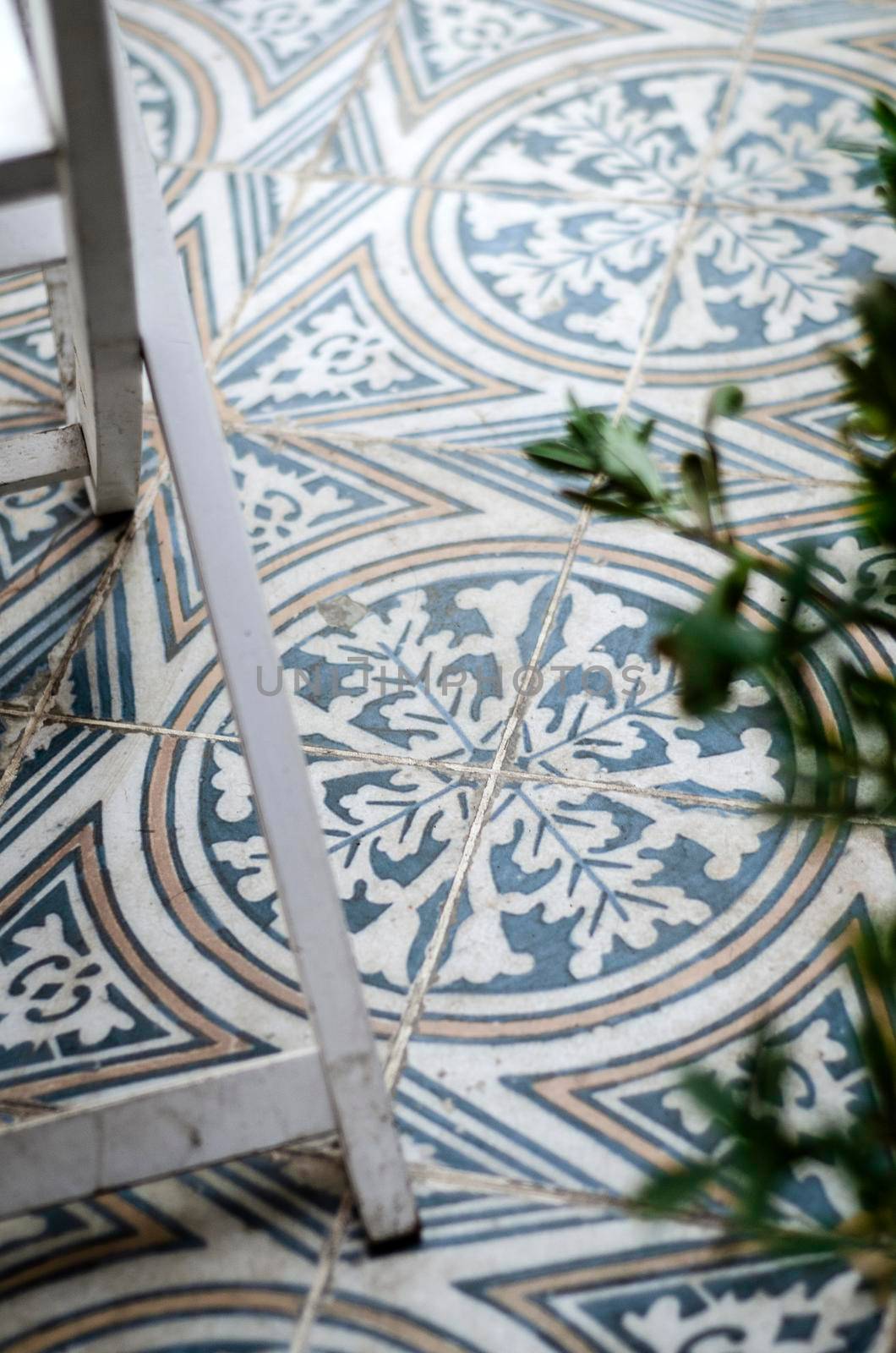 traditional design old rustic floor tiles detail in seville andalucia cafe