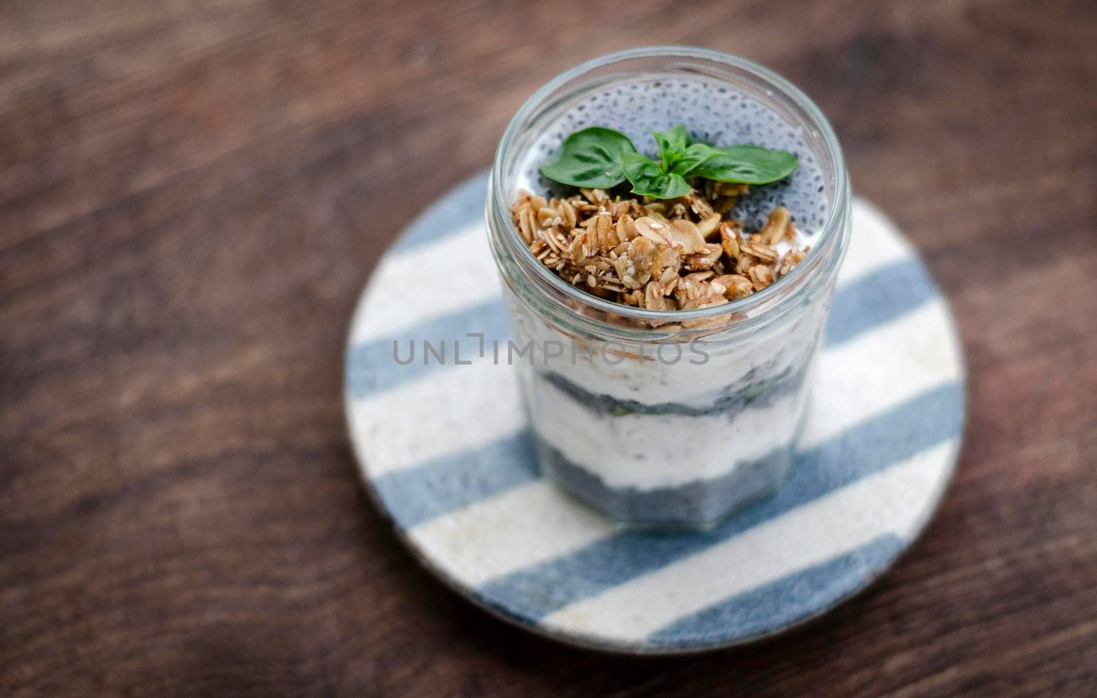 homemade healthy rustic yoghurt and granola with basil seeds breakfast snack cup
