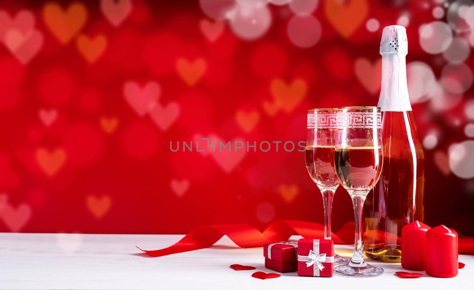 two champagne flute glasses on beautiful bokeh background by Desperada