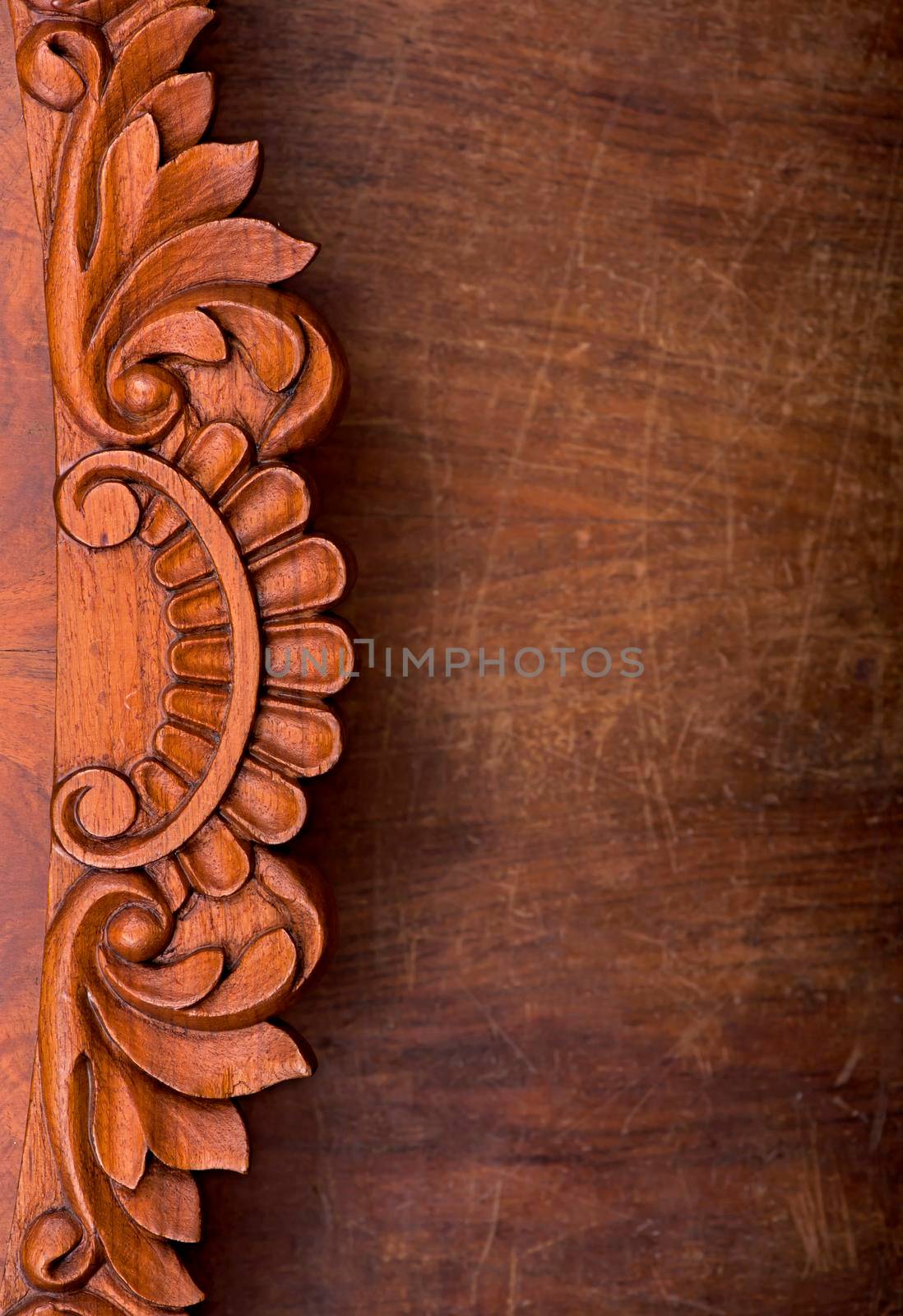 element of carved antique furniture. abstract brown wood background by aprilphoto