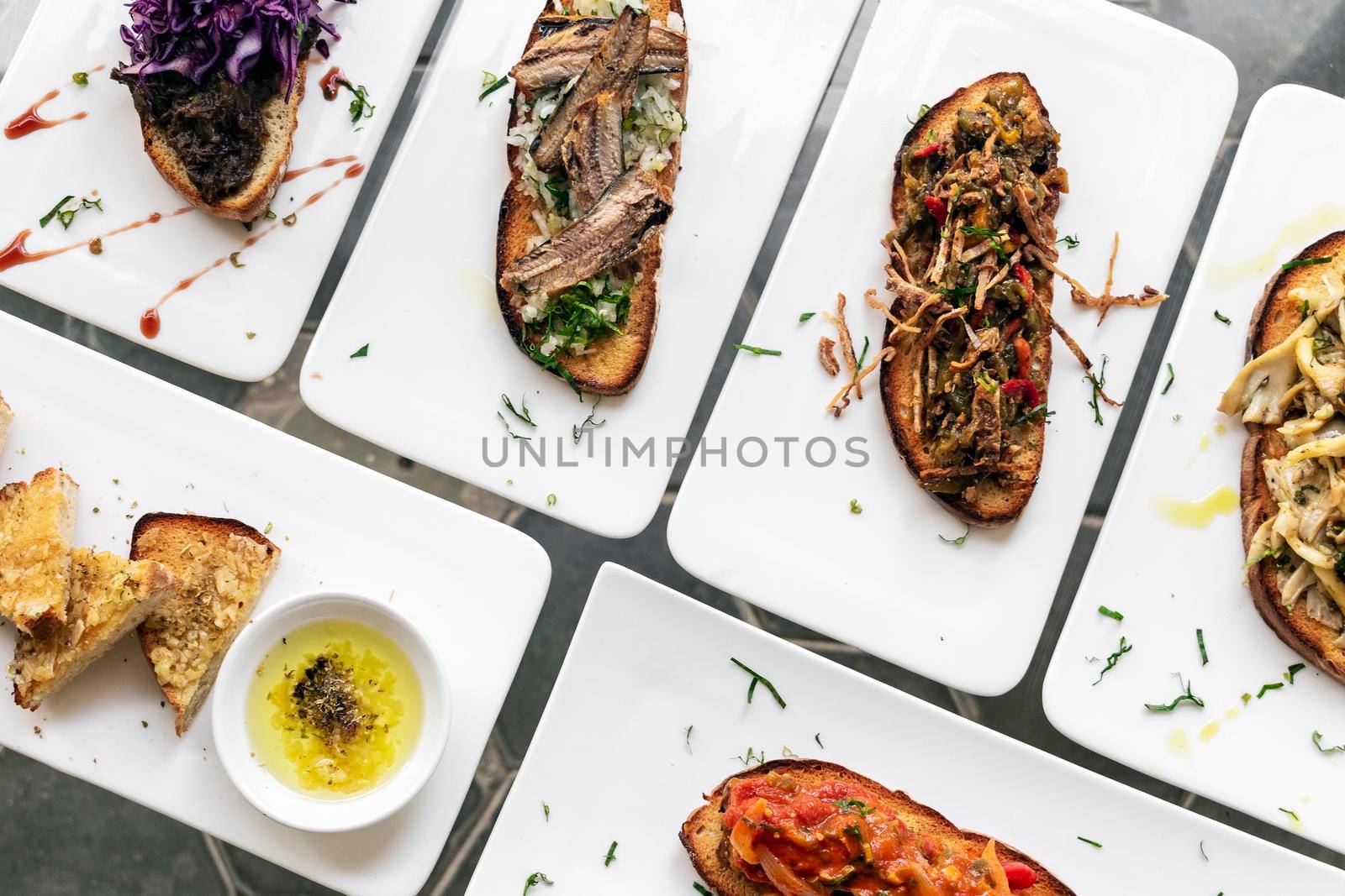 portuguese tiborna toasted open sandwich tapas snacks on table by jackmalipan