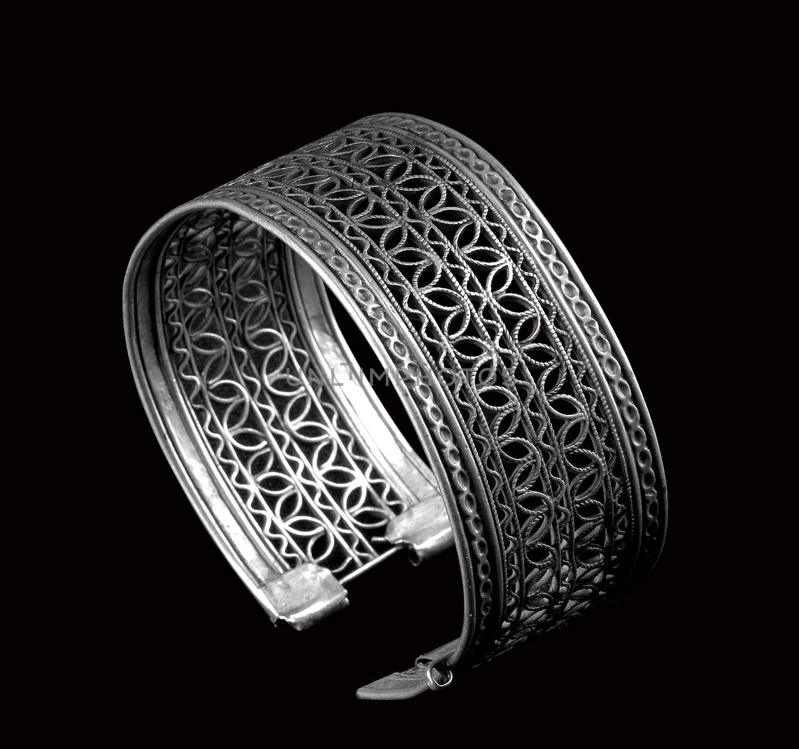Vintage silver bracelet on black background