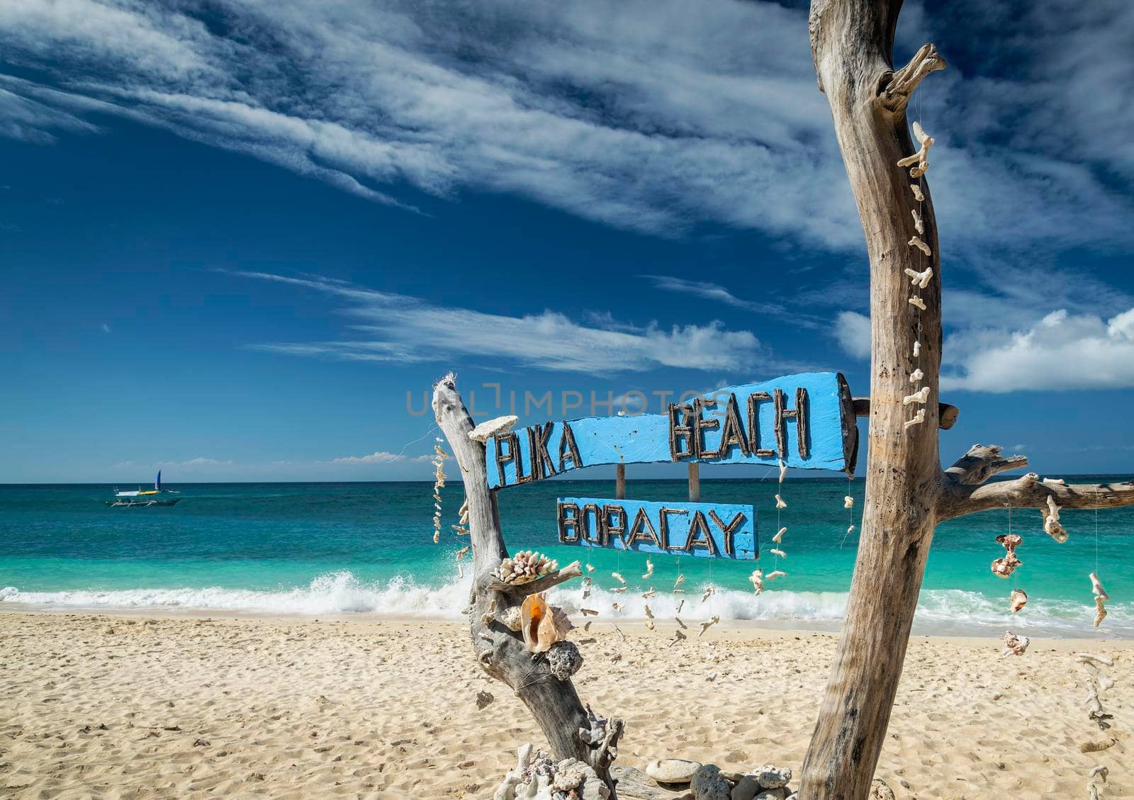 famous puka beach on tropical paradise boracay island in philippines by jackmalipan
