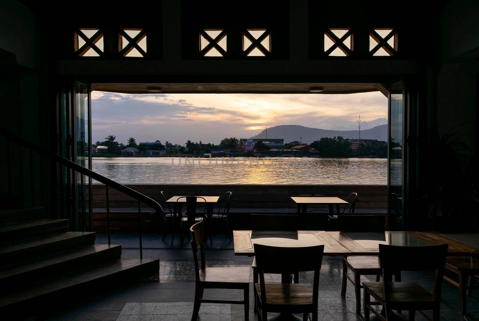 riverside bar restaurant view at sunset in kampot town cambodia