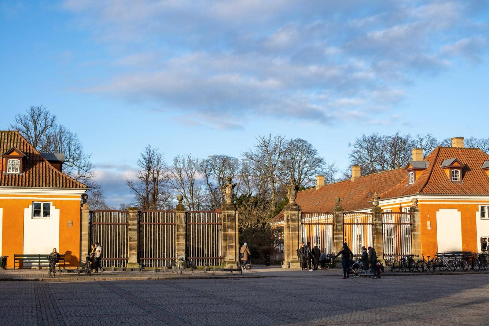 Copenhagen, Denmark - January 03, 2021: People at the main entrance to Frederiksberg Gardens.