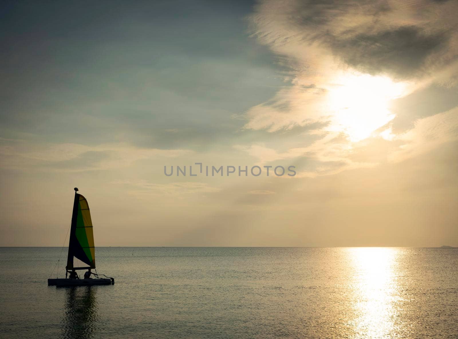 sailing boat at sea during sunset in phuket coast of thailand