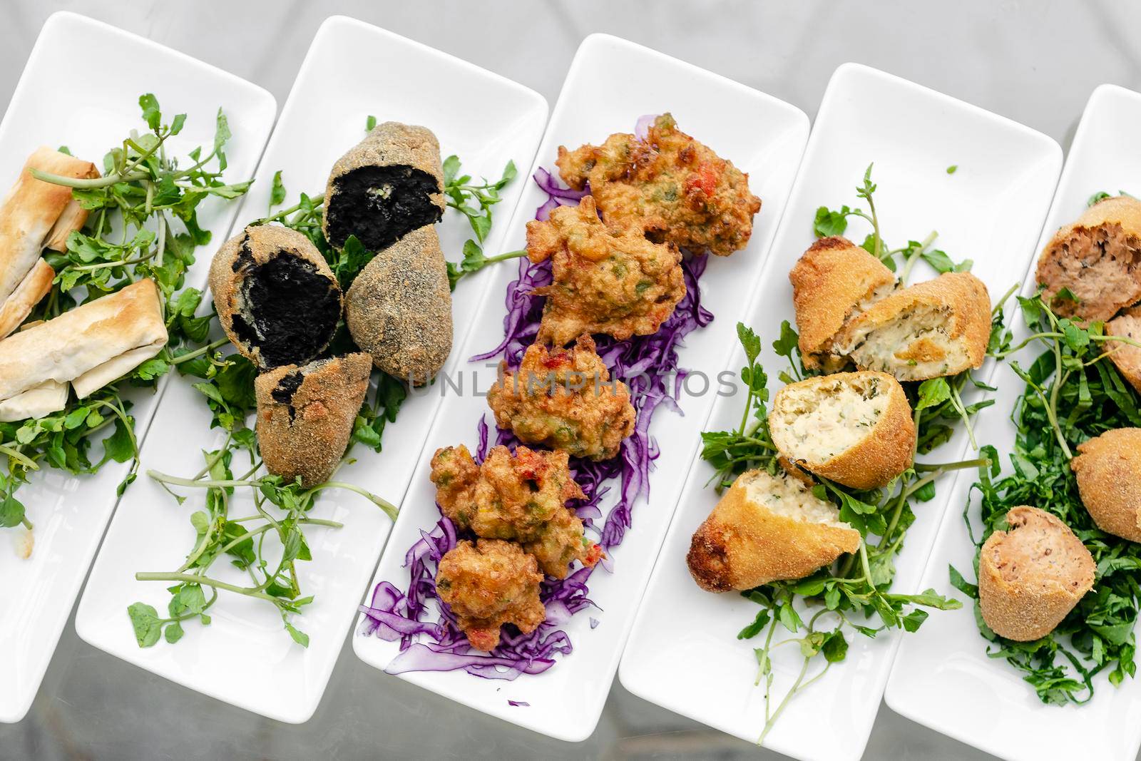 selection of traditional portuguese tapas snacks on lisbon restaurant table