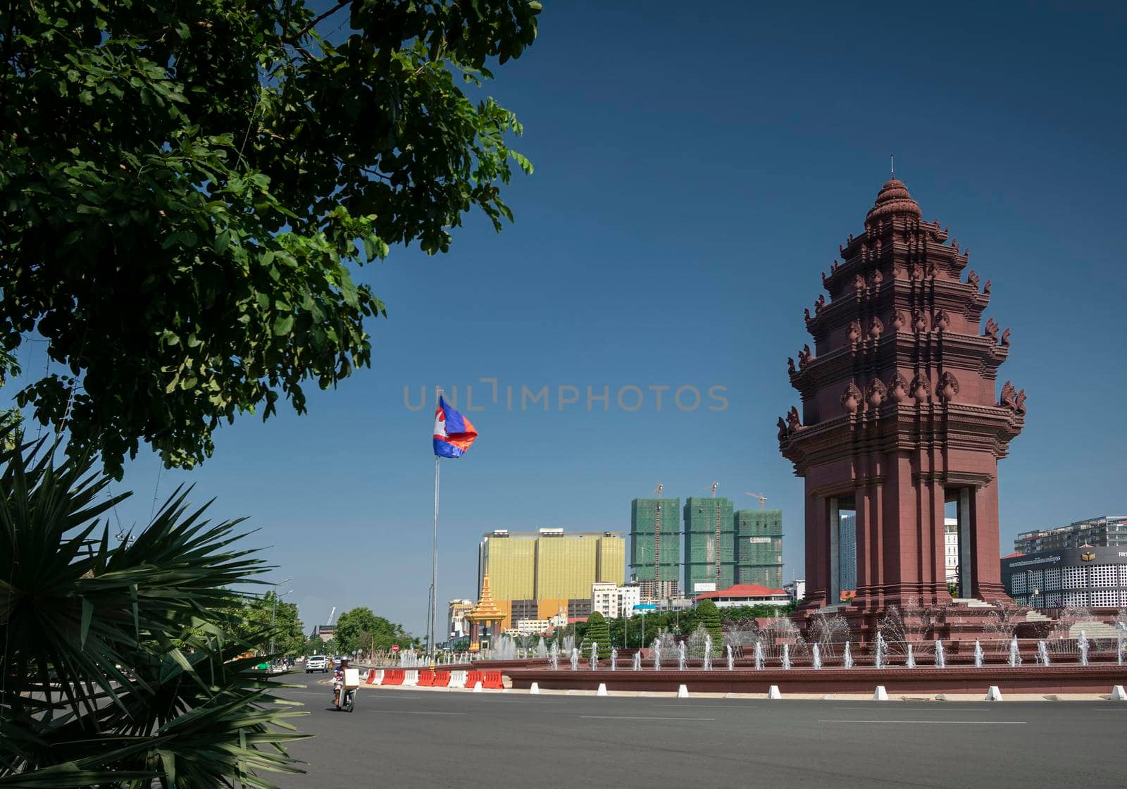 independence monument landmark in central downtown phnom penh city cambodia by jackmalipan