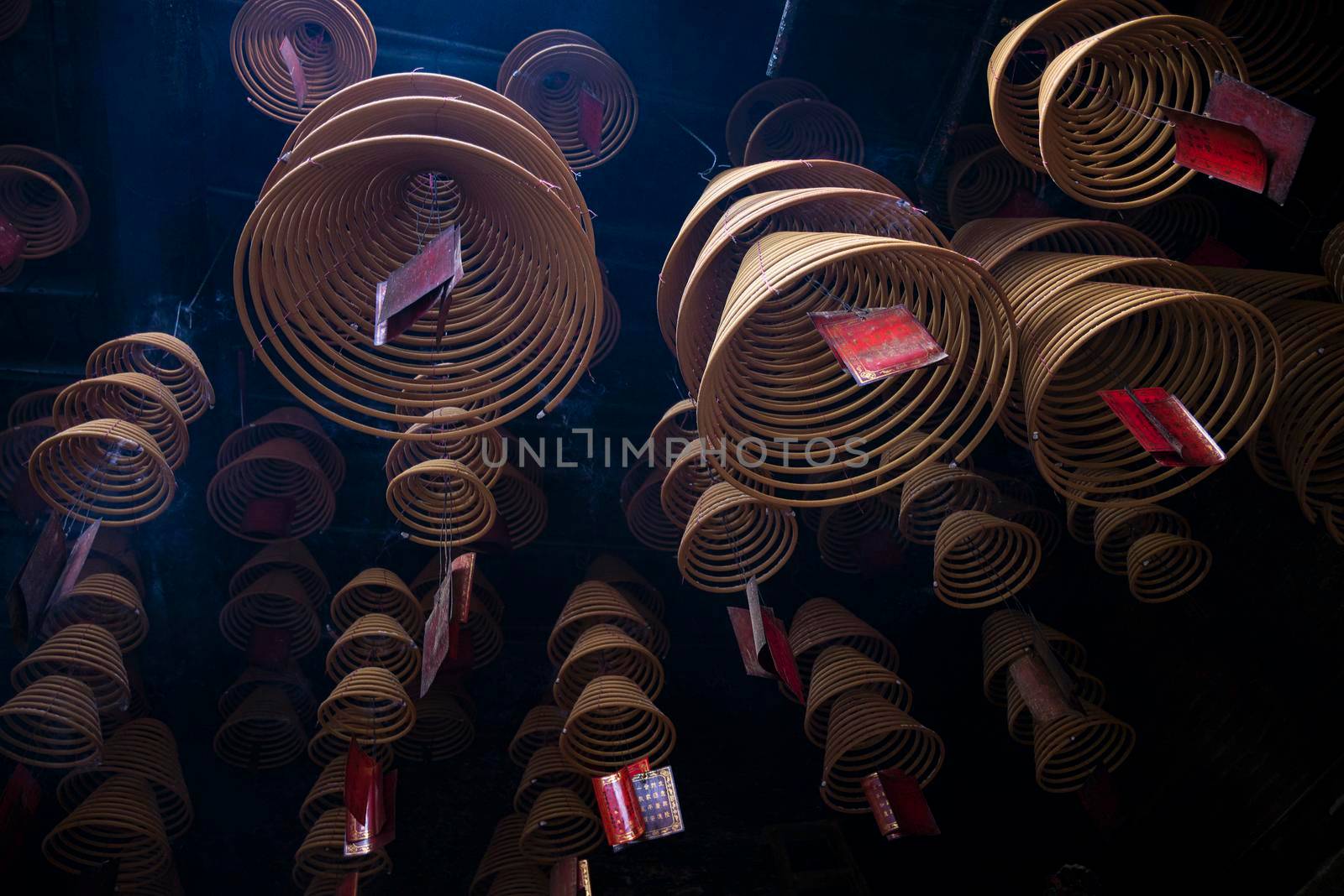 traditional  burning incense coils inside chinese a-ma temple in macau by jackmalipan