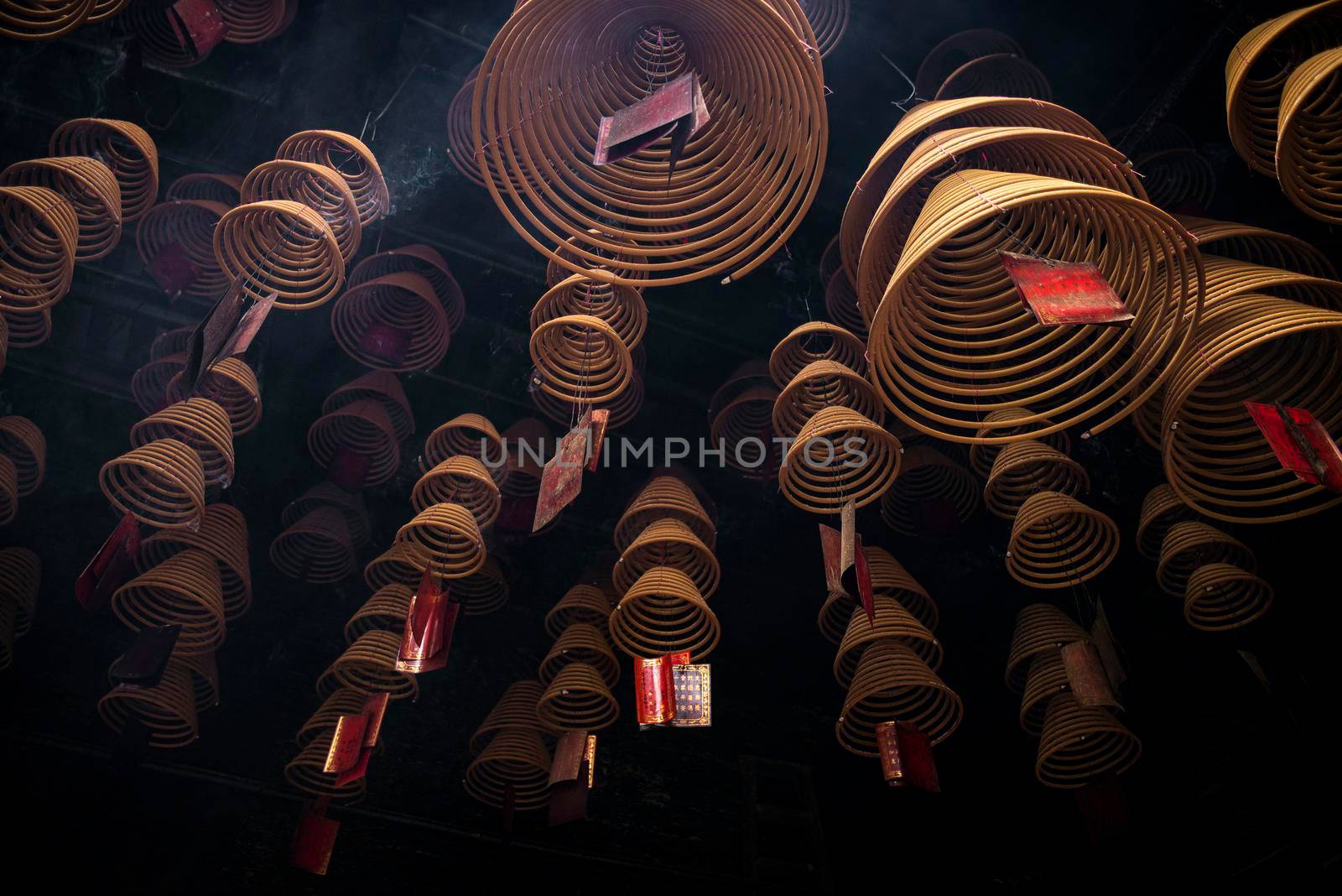 traditional  burning incense coils inside chinese a-ma buddhist temple in macau china