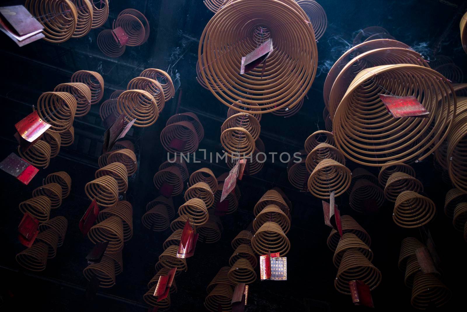 traditional  burning incense coils inside chinese a-ma buddhist temple in macau china