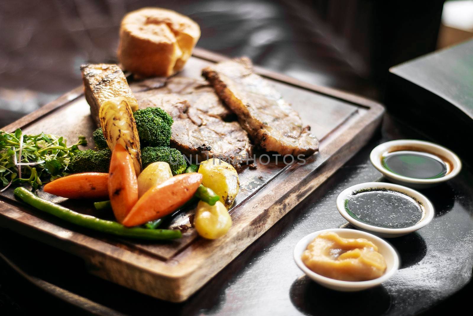 gourmet sunday roast beef traditional british meal set on old wooden pub table