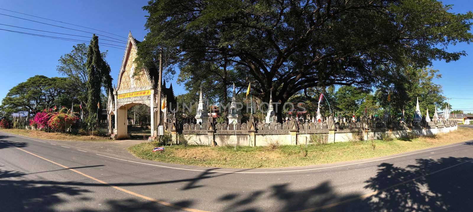 Temple next to the road in Prasat Thong Thailand