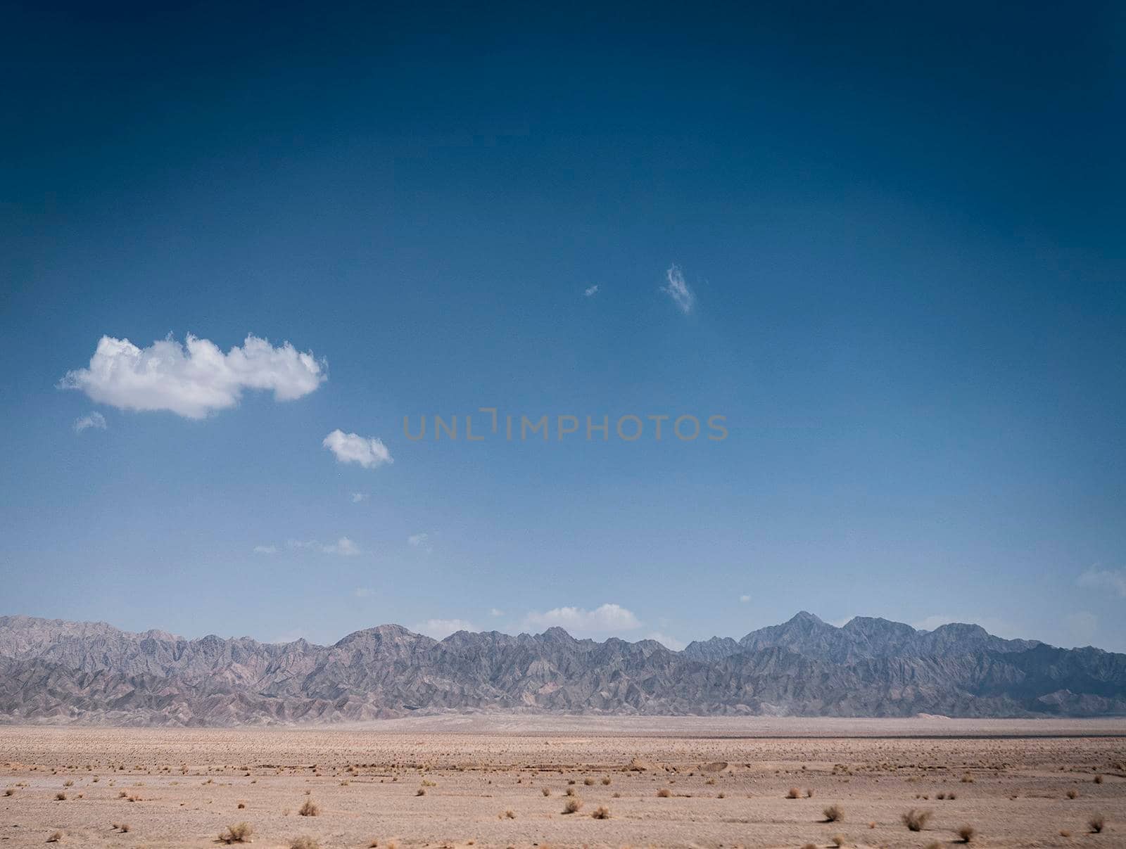 dry desert landscape view near yazd in southern iran by jackmalipan