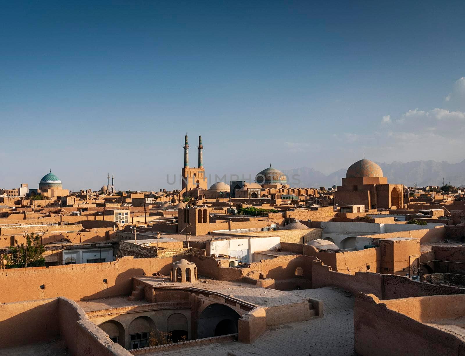 rooftops downtown mosque and landscape view of yazd city old town in iran