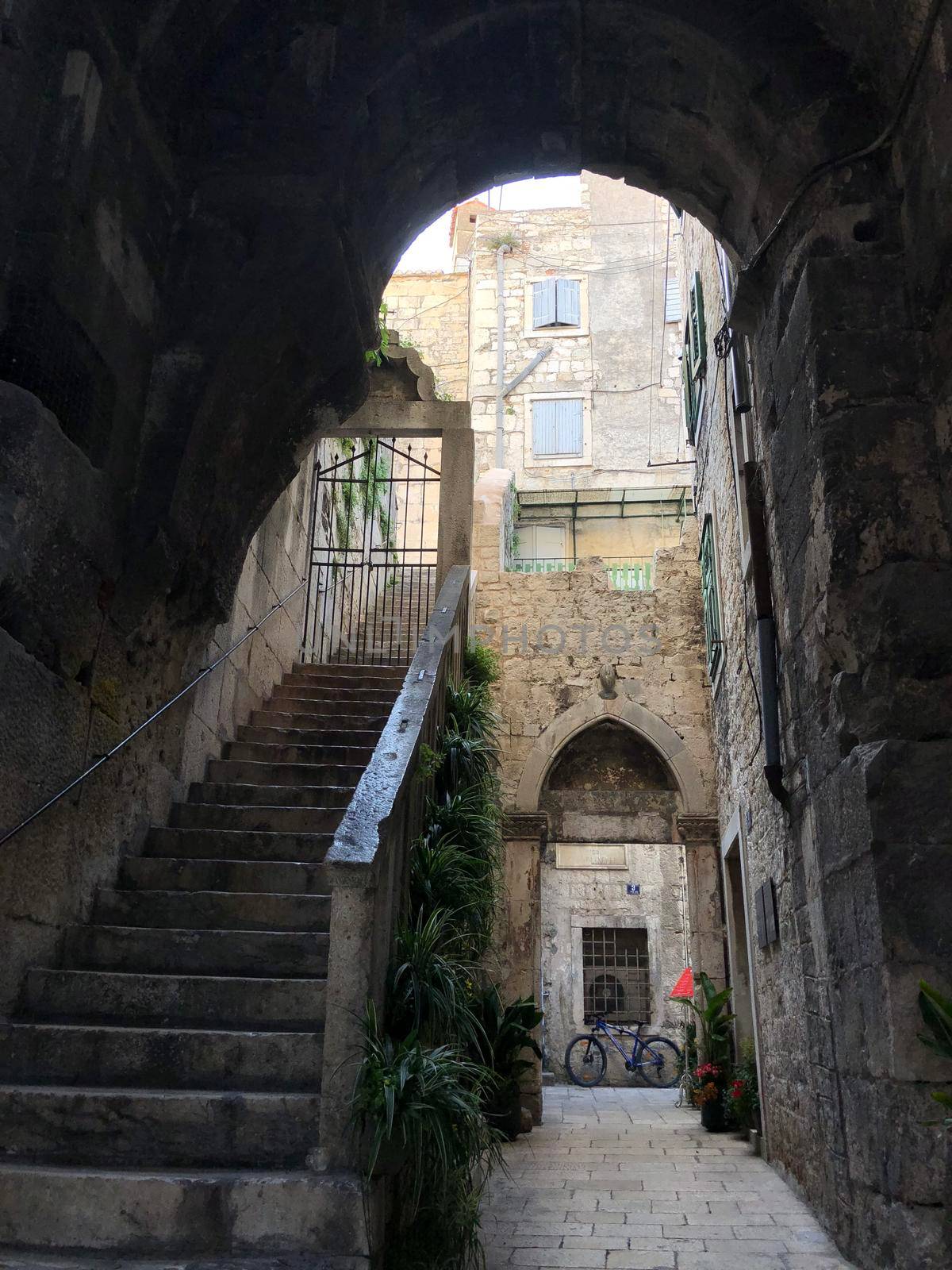 Stairs in the old town of Split  by traveltelly