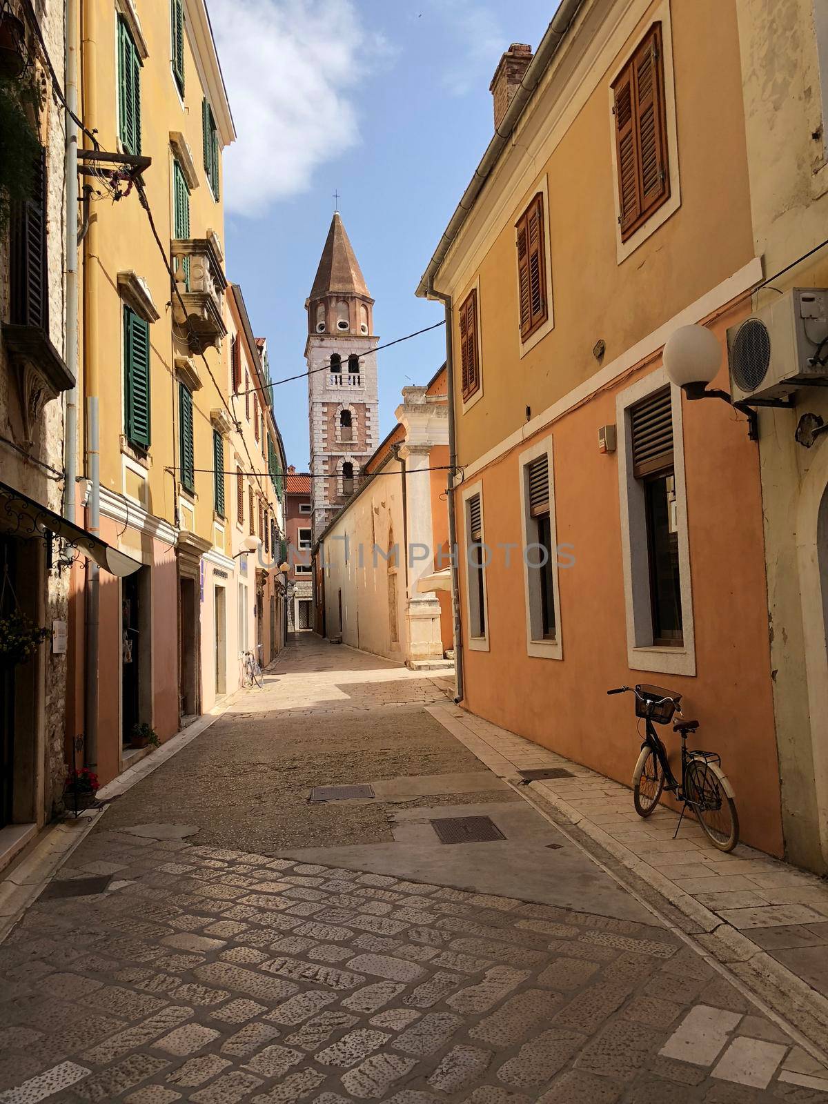 Sveti Sime church seen from a street  by traveltelly