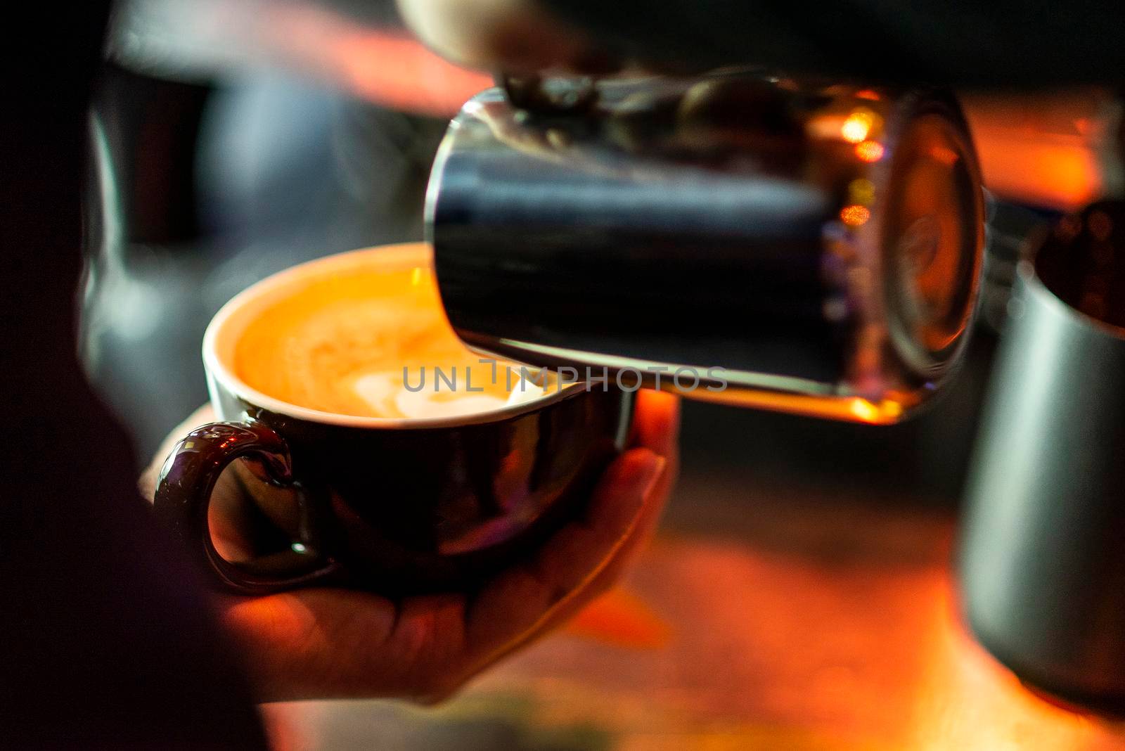 making espresso coffee close up detail with modern machine by jackmalipan