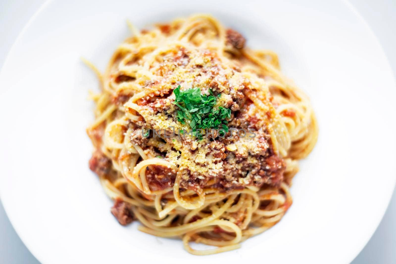 spaghetti pasta bolognaise with beef and tomato parmesan sauce by jackmalipan