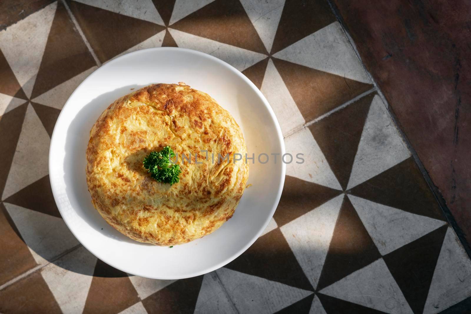 spanish tortilla omelet traditional tapas food on traditional rustic background by jackmalipan