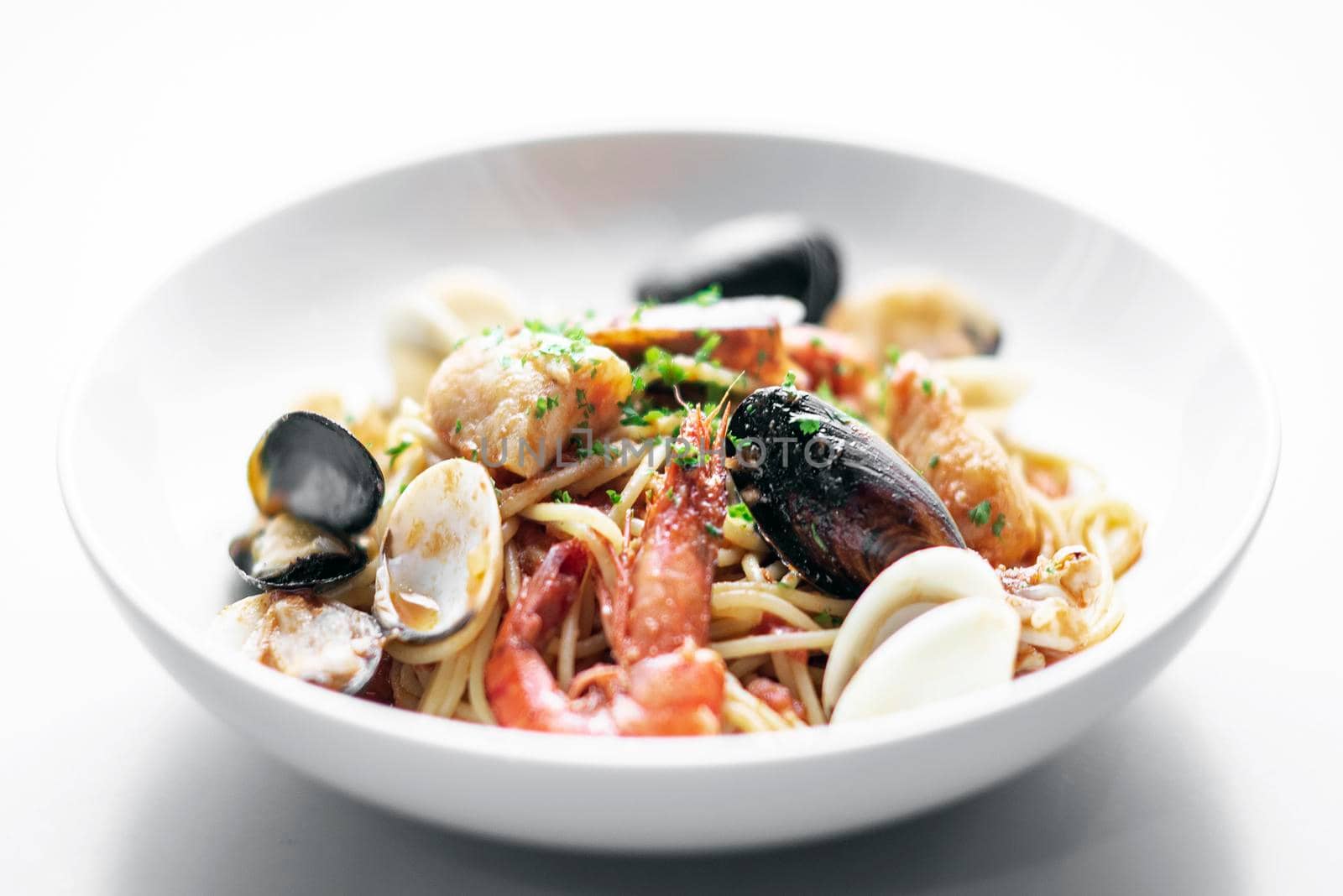 italian mixed fresh seafood spaghetti pasta with prawns mussels scallops and clams