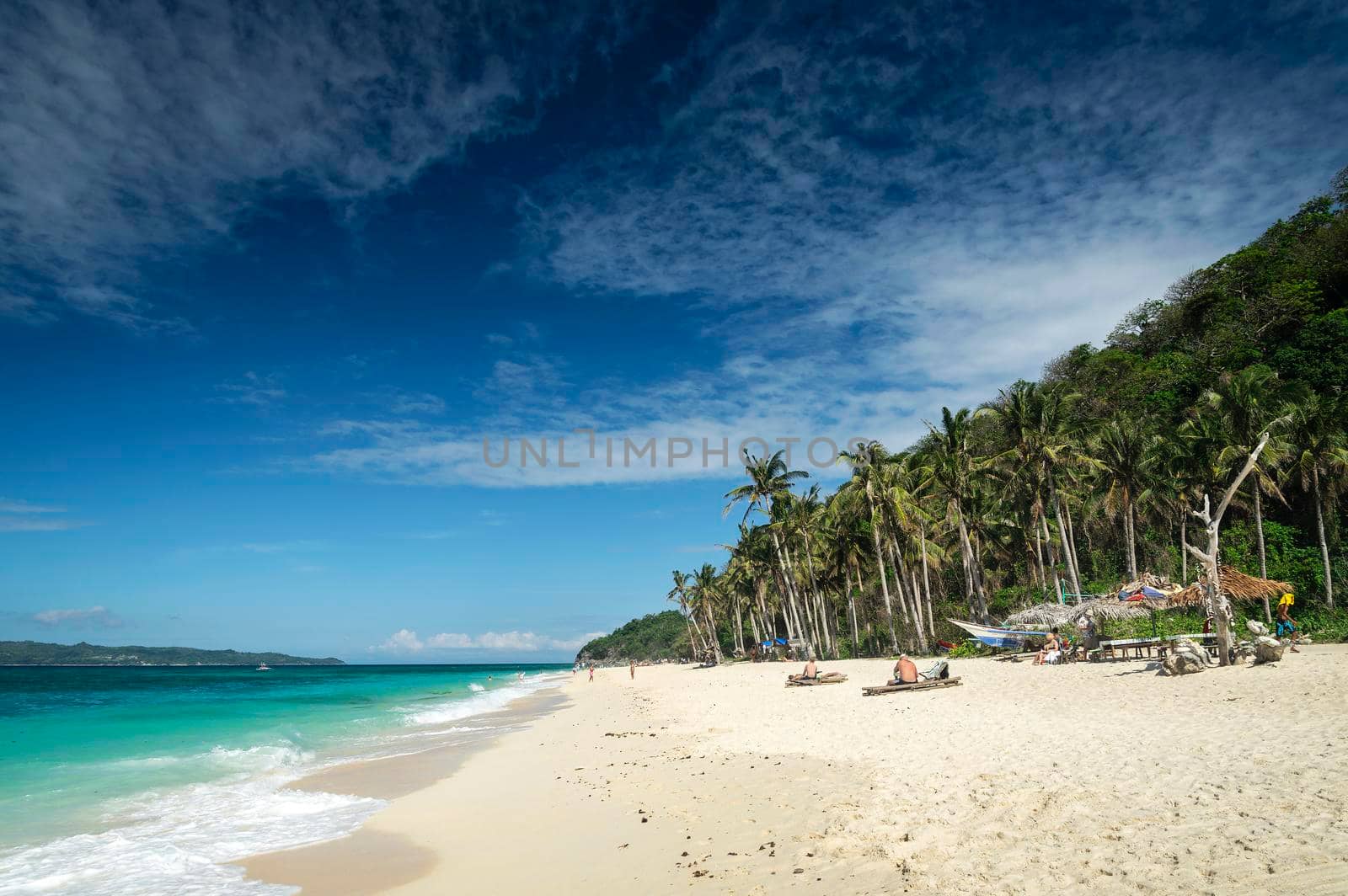 famous puka beach on tropical paradise boracay island in philippines by jackmalipan