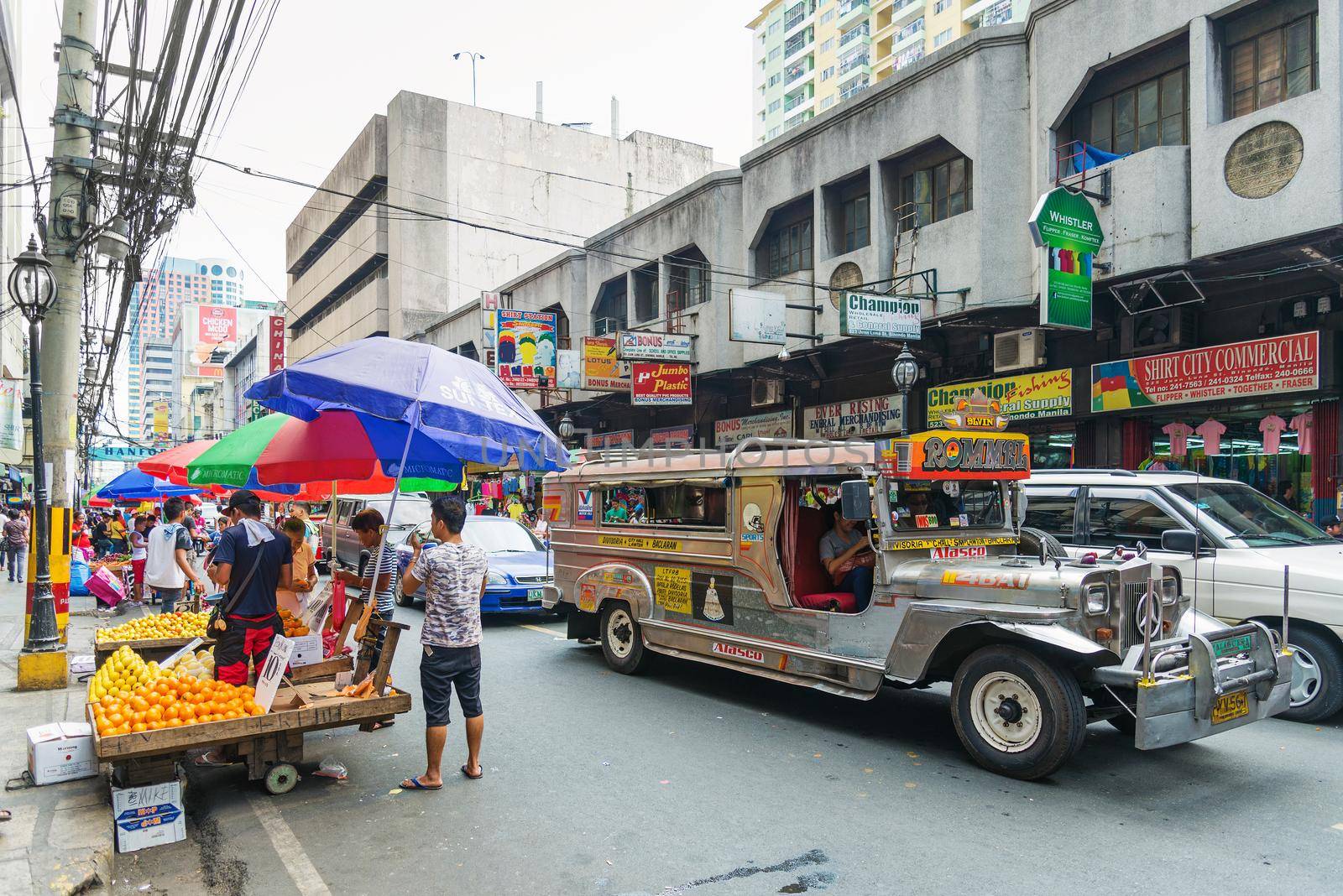 jeepney bus in manila chinatown street in philippines