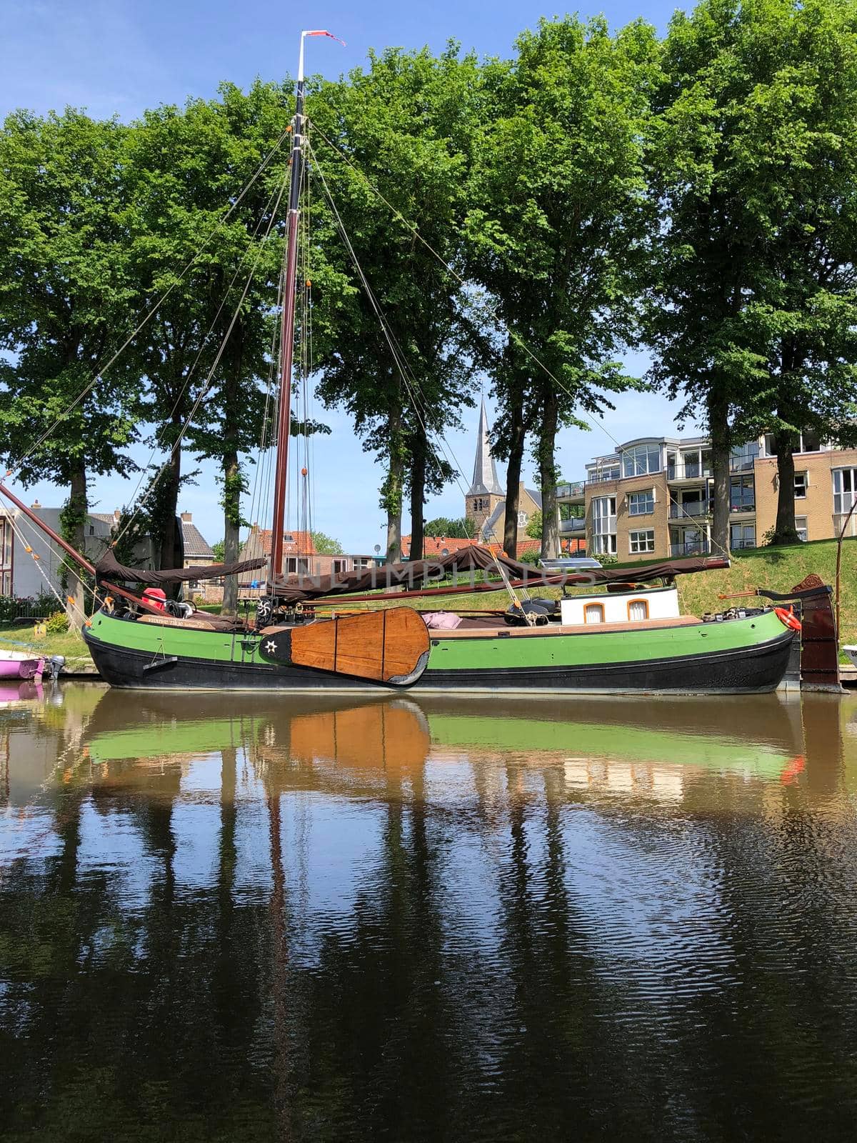 Sailboat in a canal around Harlingen, Friesland The Netherlands