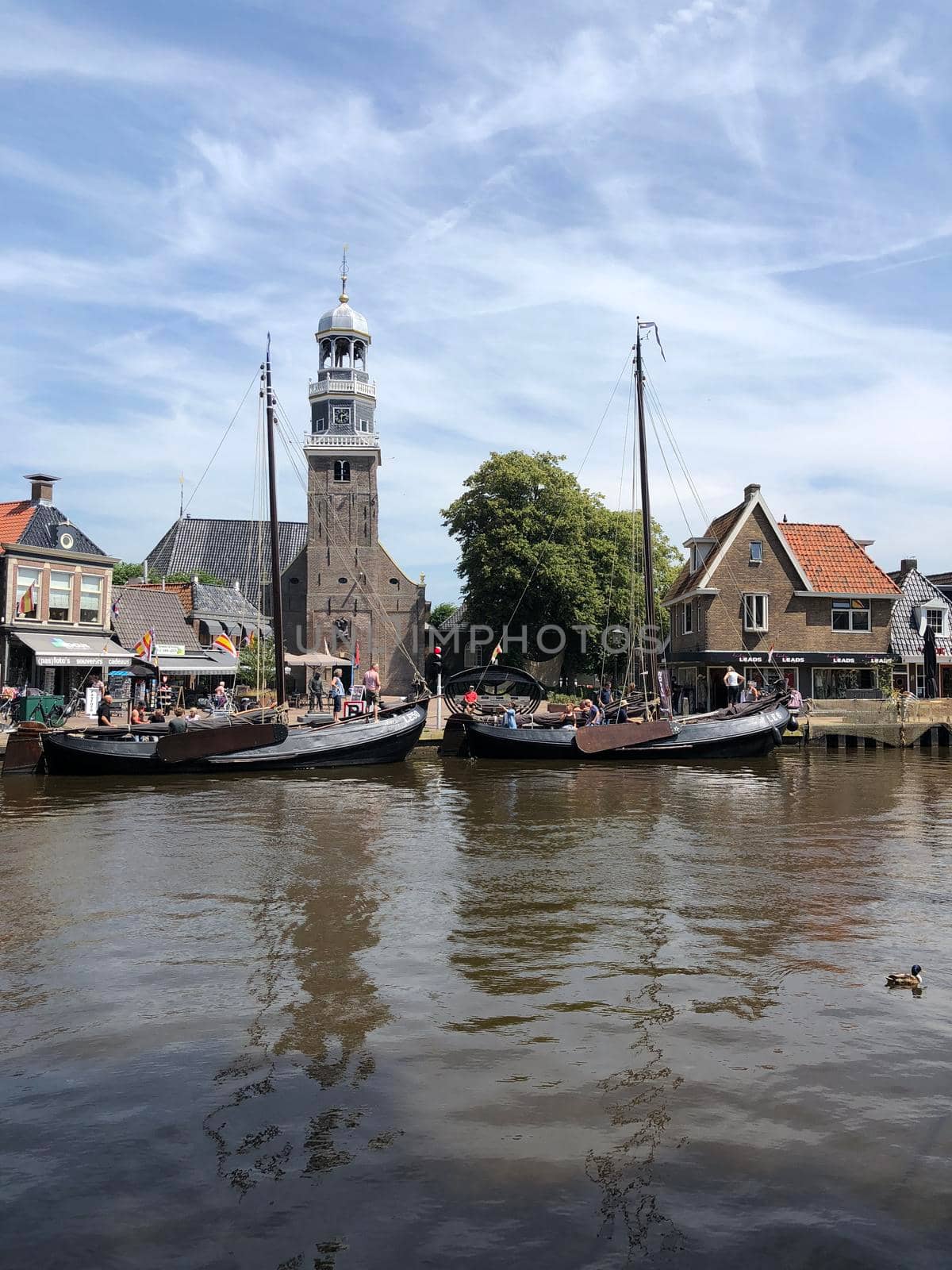 Sailboats in the canal of Lemmer, Friesland The Netherlands