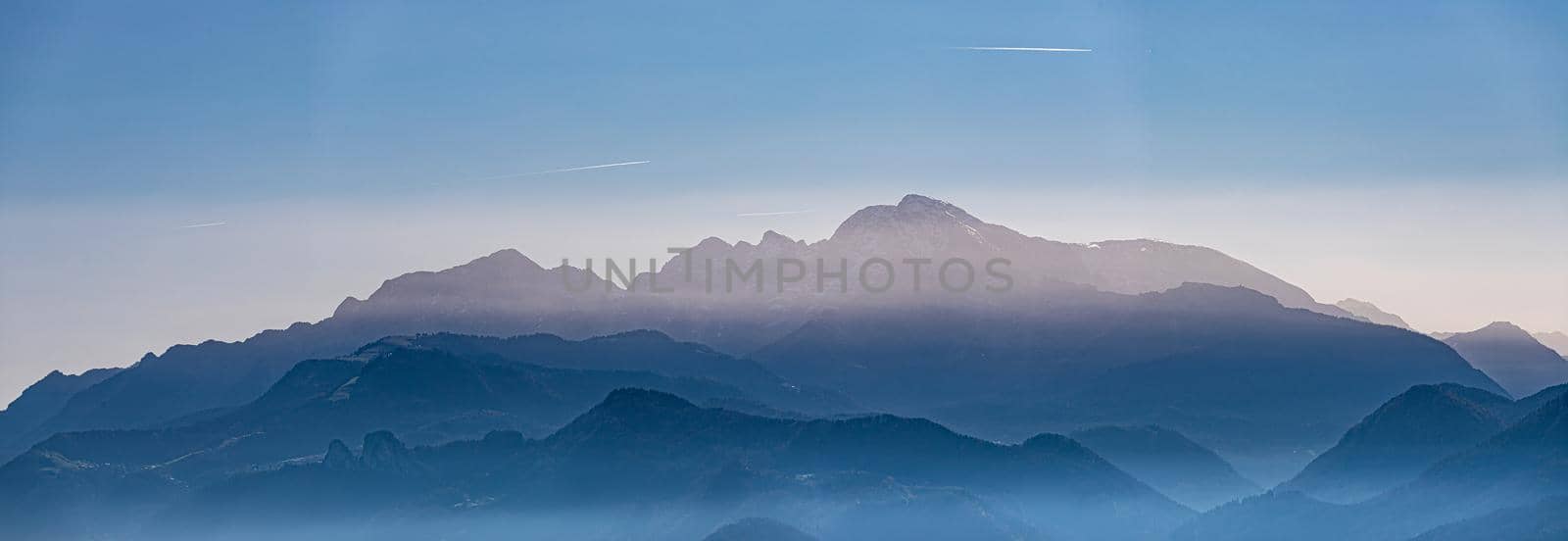 Silhouette of mountains chain in the evening, Austria by Daxenbichler