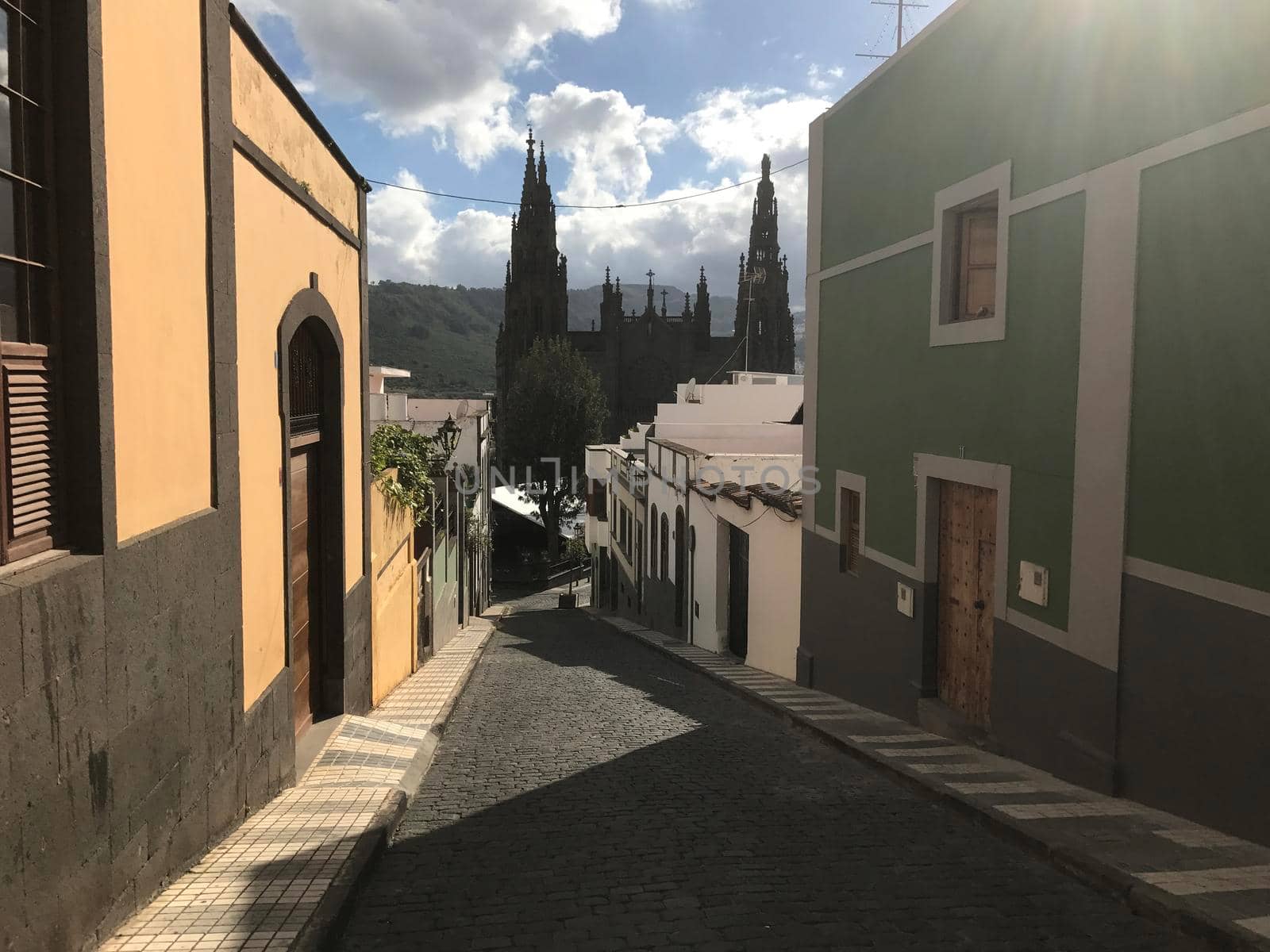 Street towards Arucas catedral by traveltelly