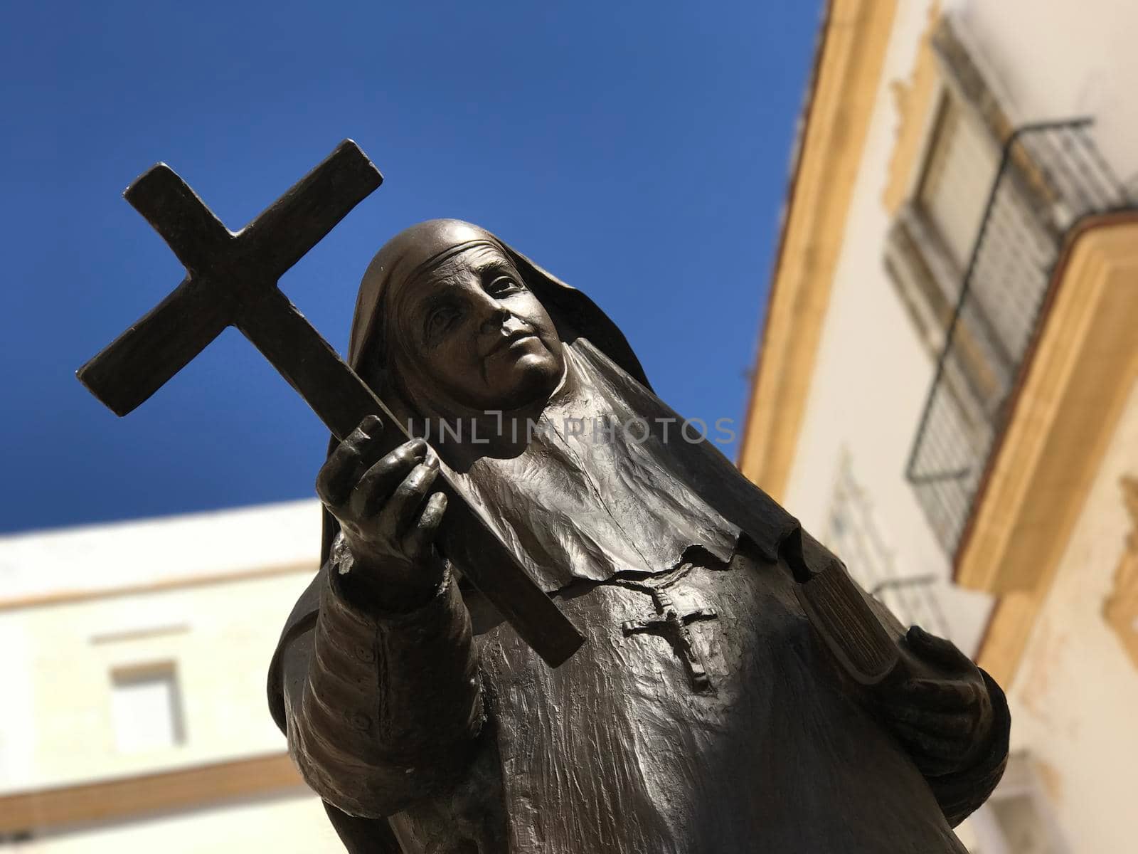 Santa Angela de La Cruz statue  by traveltelly