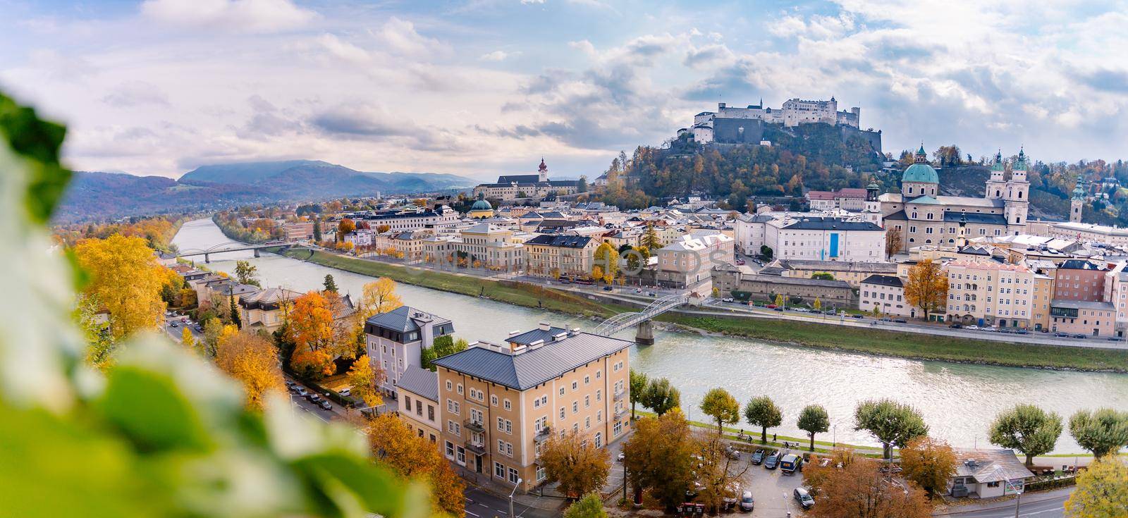 Salzburg old city in autumn, colorful sunshine, Austria. Panorama by Daxenbichler