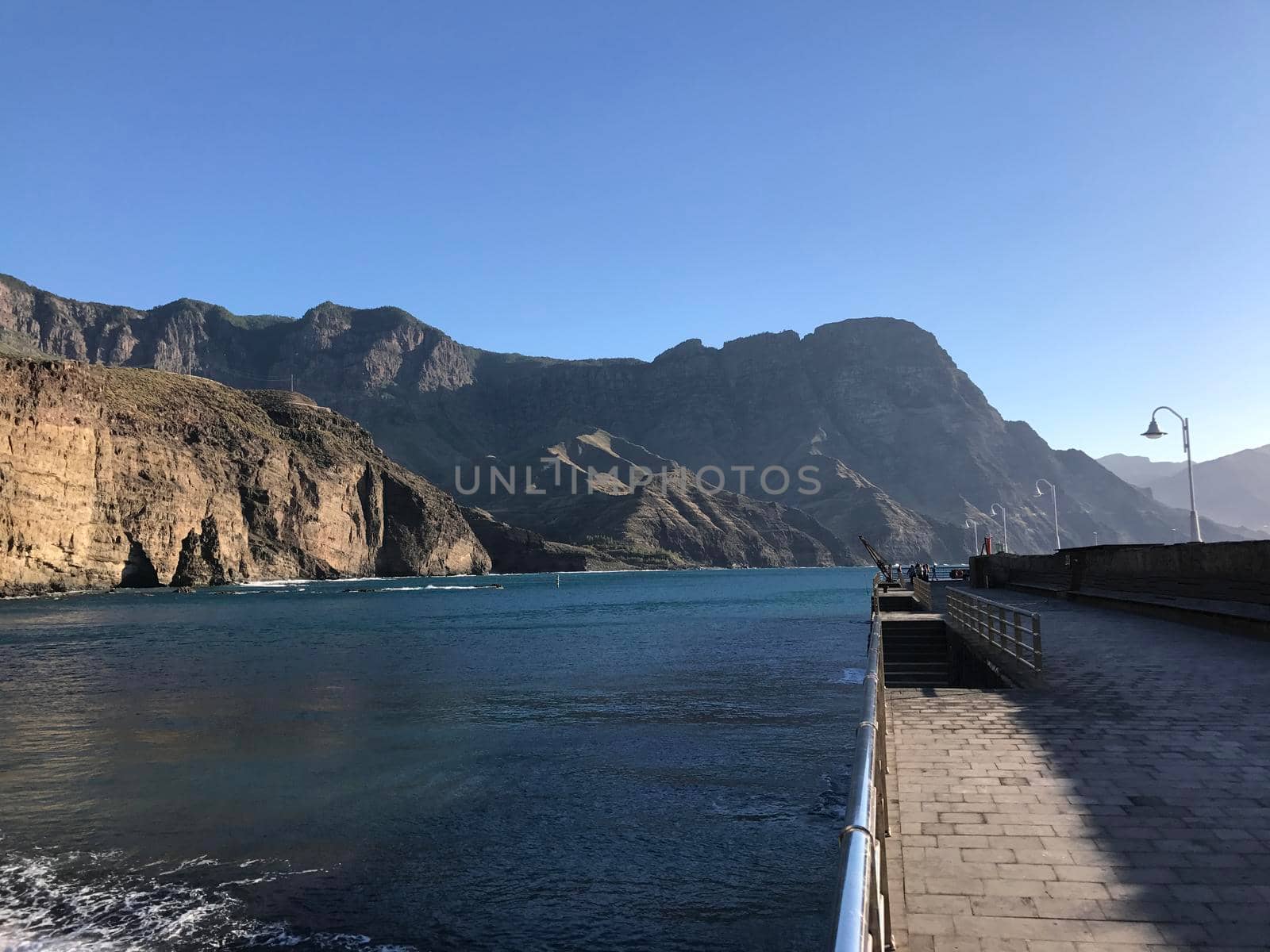 Pier at Puerto de las Nieves  by traveltelly