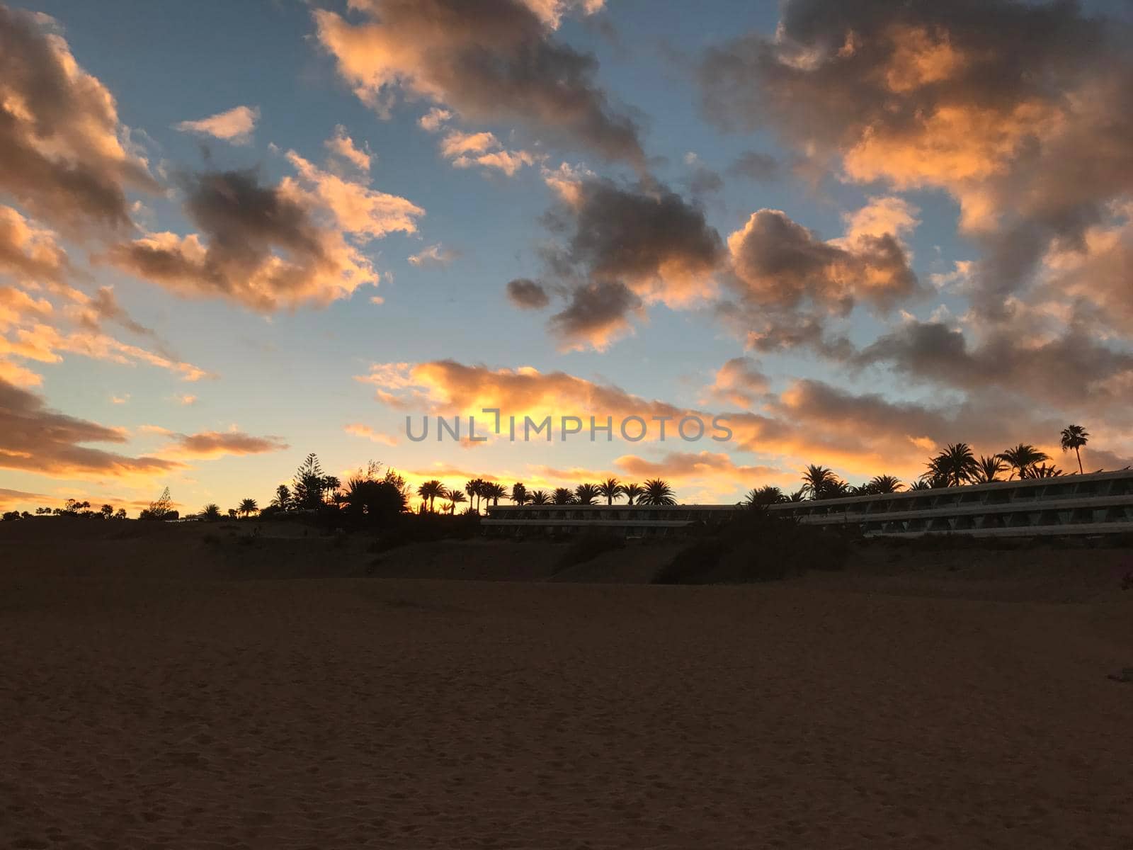 Sunset at the sand dunes in Maspalomas by traveltelly