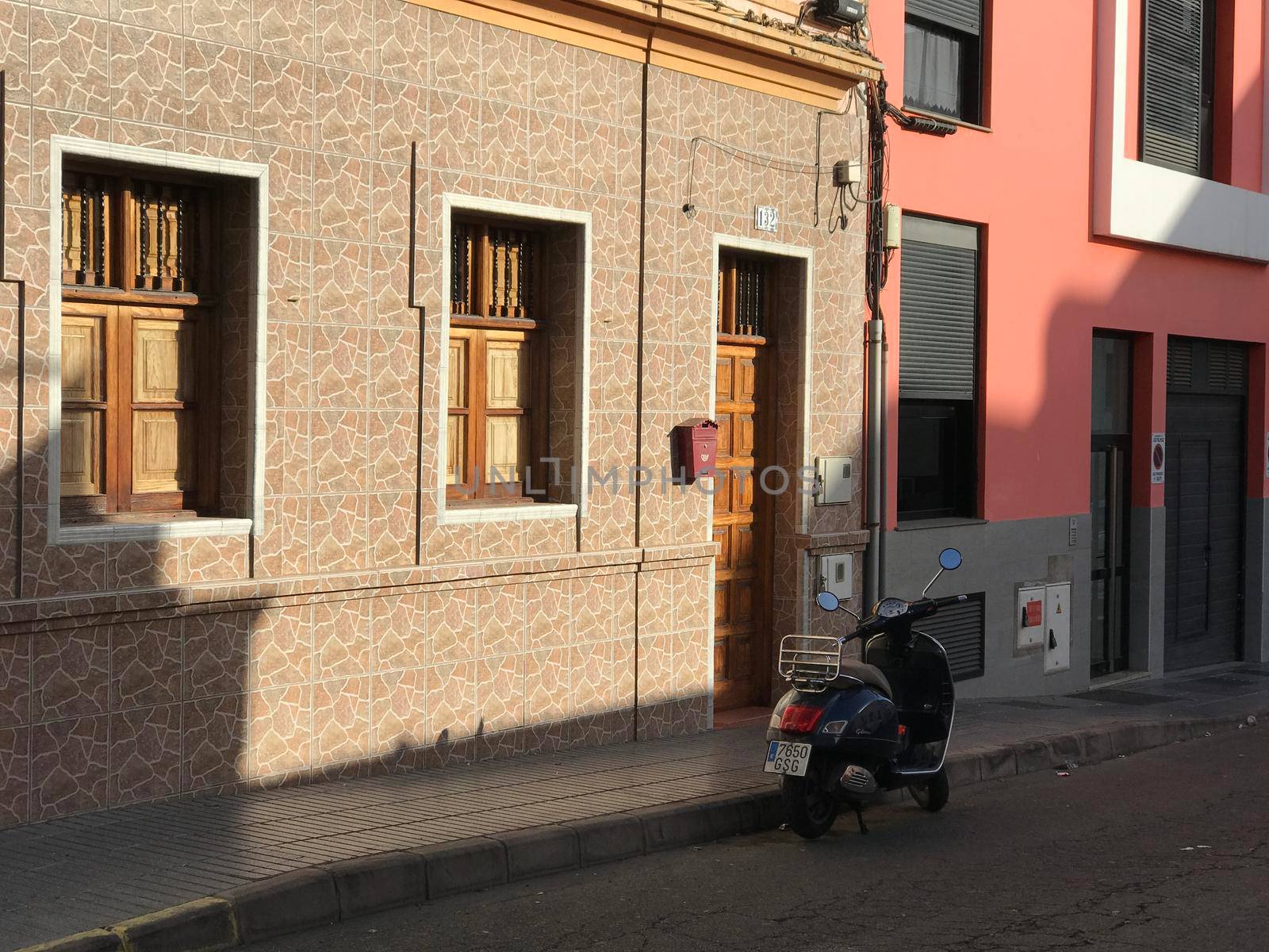 Scooter in the street and neighbourhood El confital in Las Palmas Gran Canaria