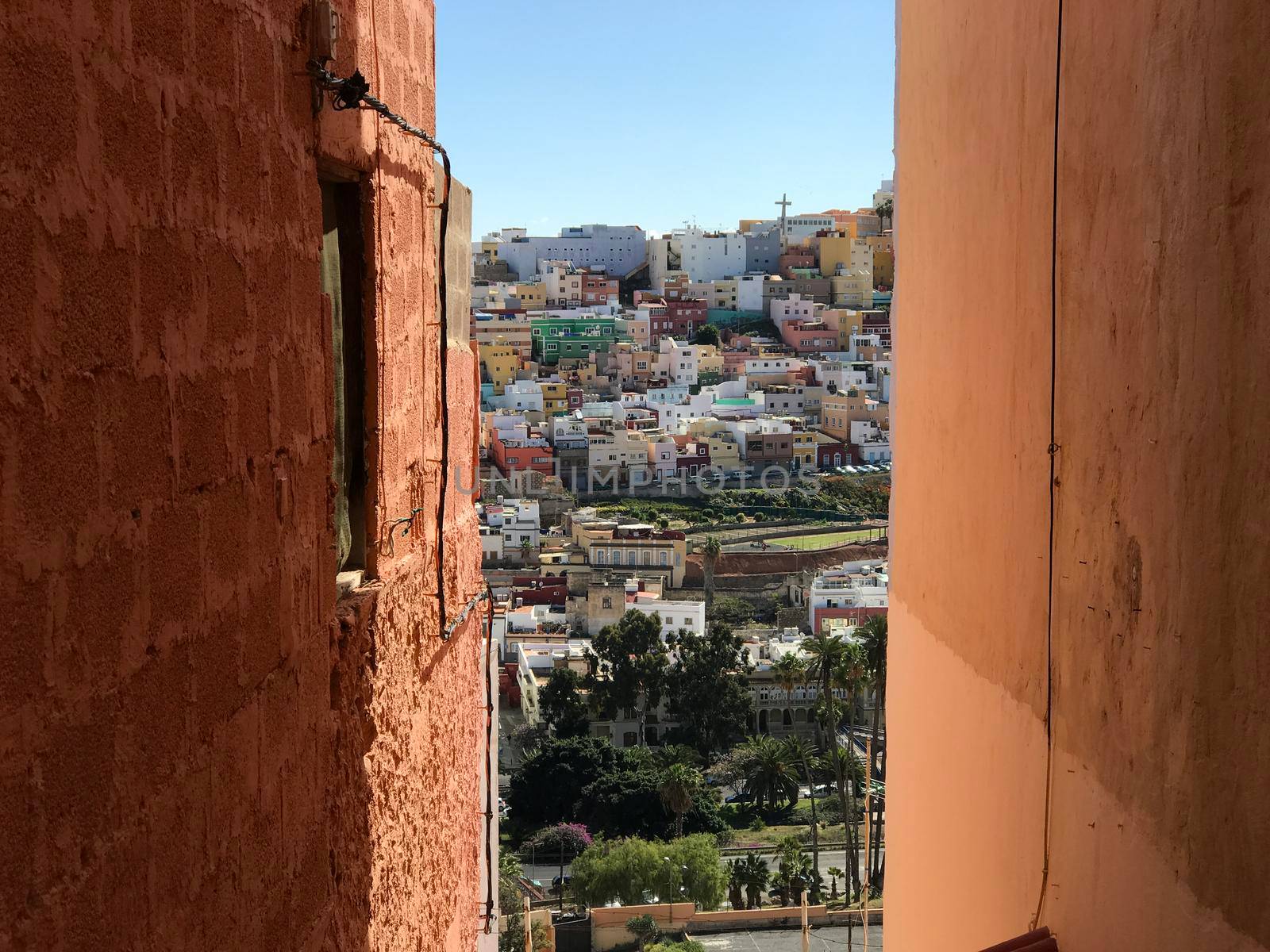 Narrow street in Las Palmas  by traveltelly