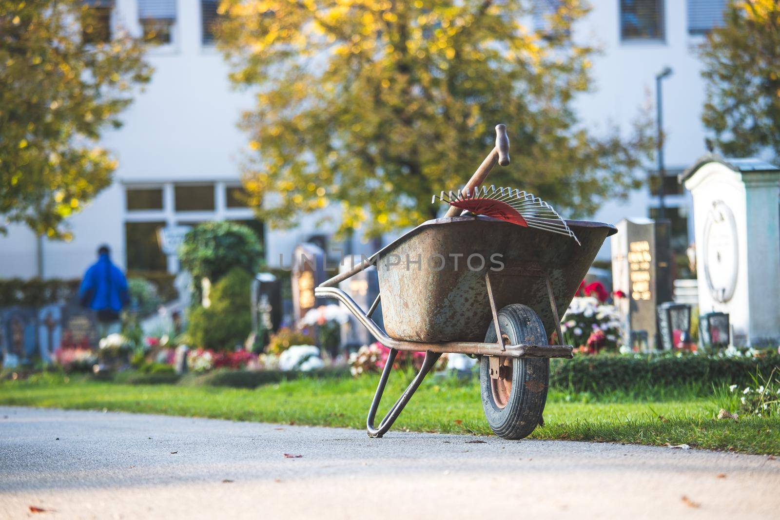 Close up of grey wheelbarrow in a park, gardening