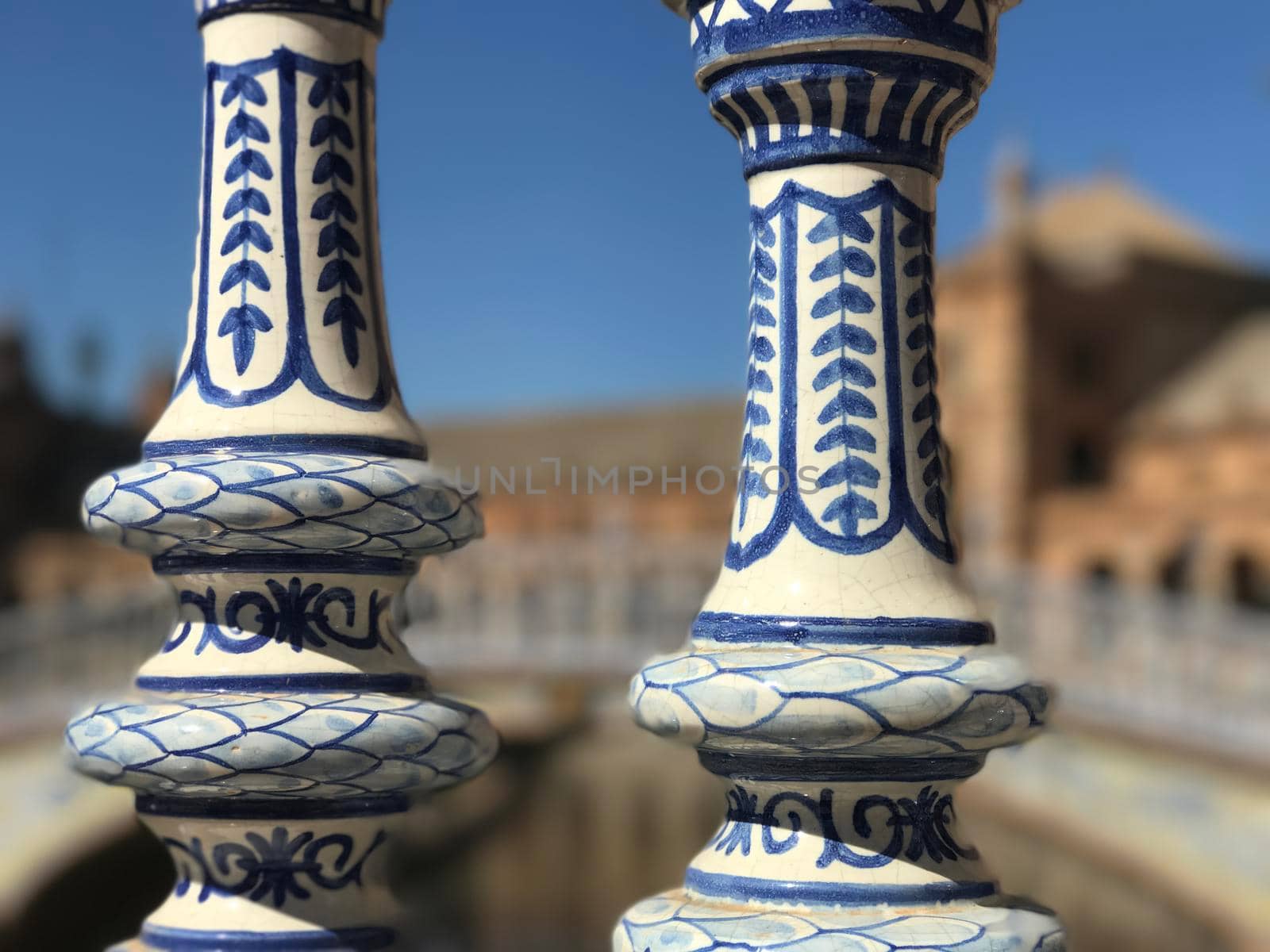 Painted pillars at Plaza de Espana in Seville Spain