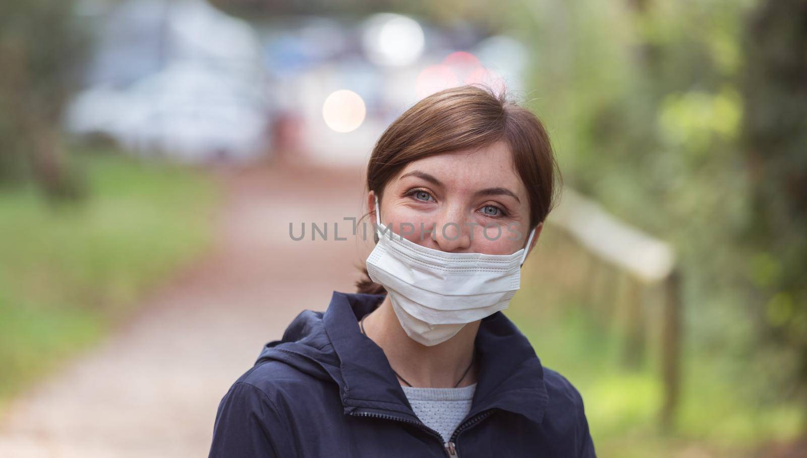 Young woman is wearing face mask wrong, nose uncovered