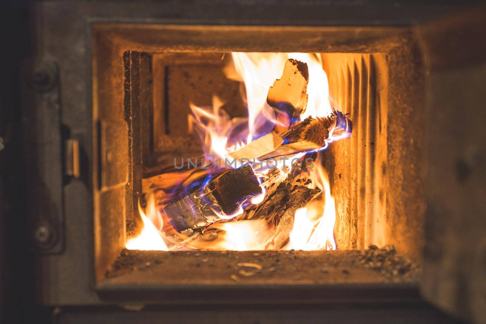 Blaze fire flame in stove, orange and black