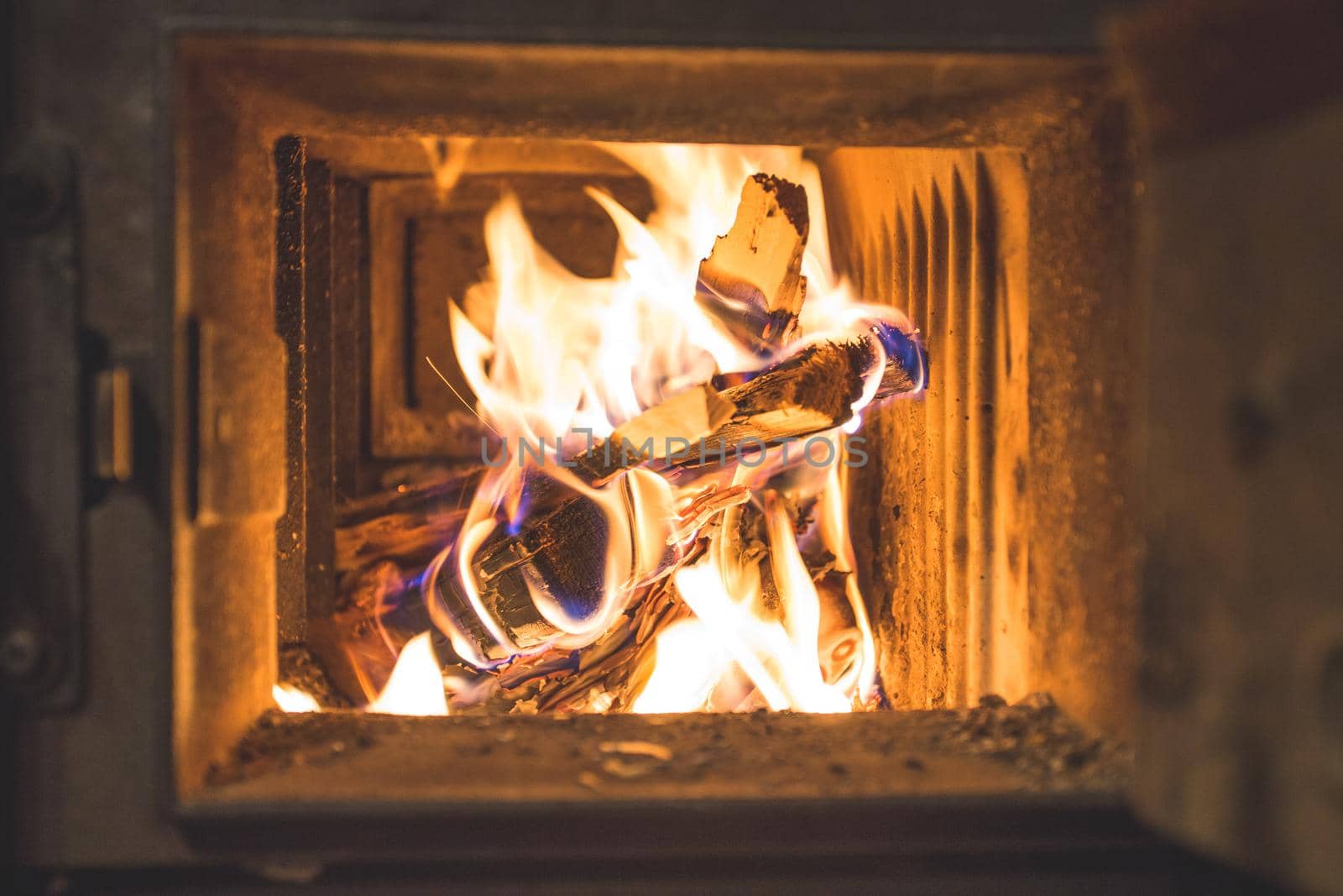 Blaze fire flame in stove, orange and black