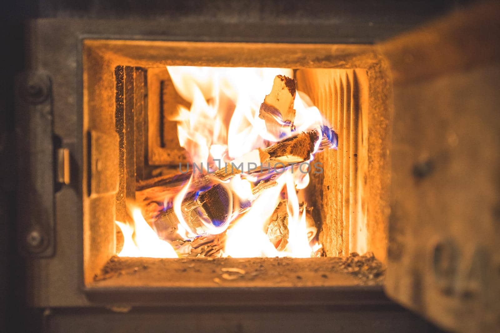 Blaze fire flame in stove, orange and black