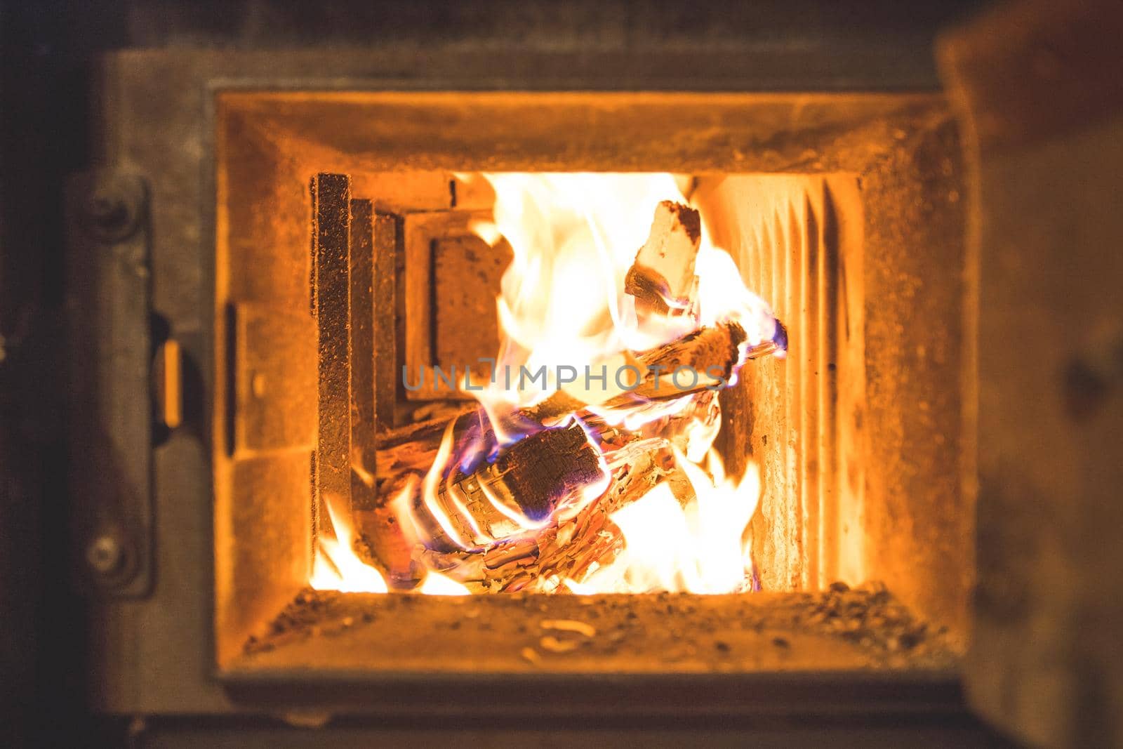 Blaze fire flame in stove, orange and black