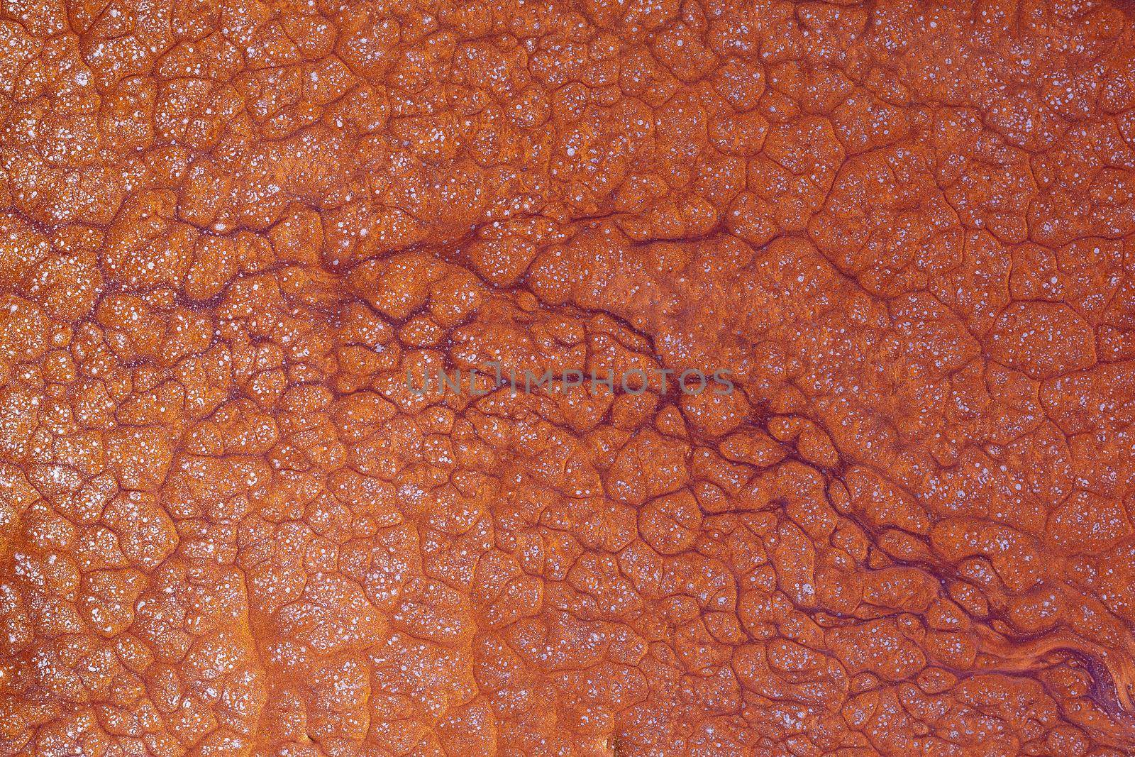 Abstract background texture, brown, liquid acrylic with the addition of gold glitter.