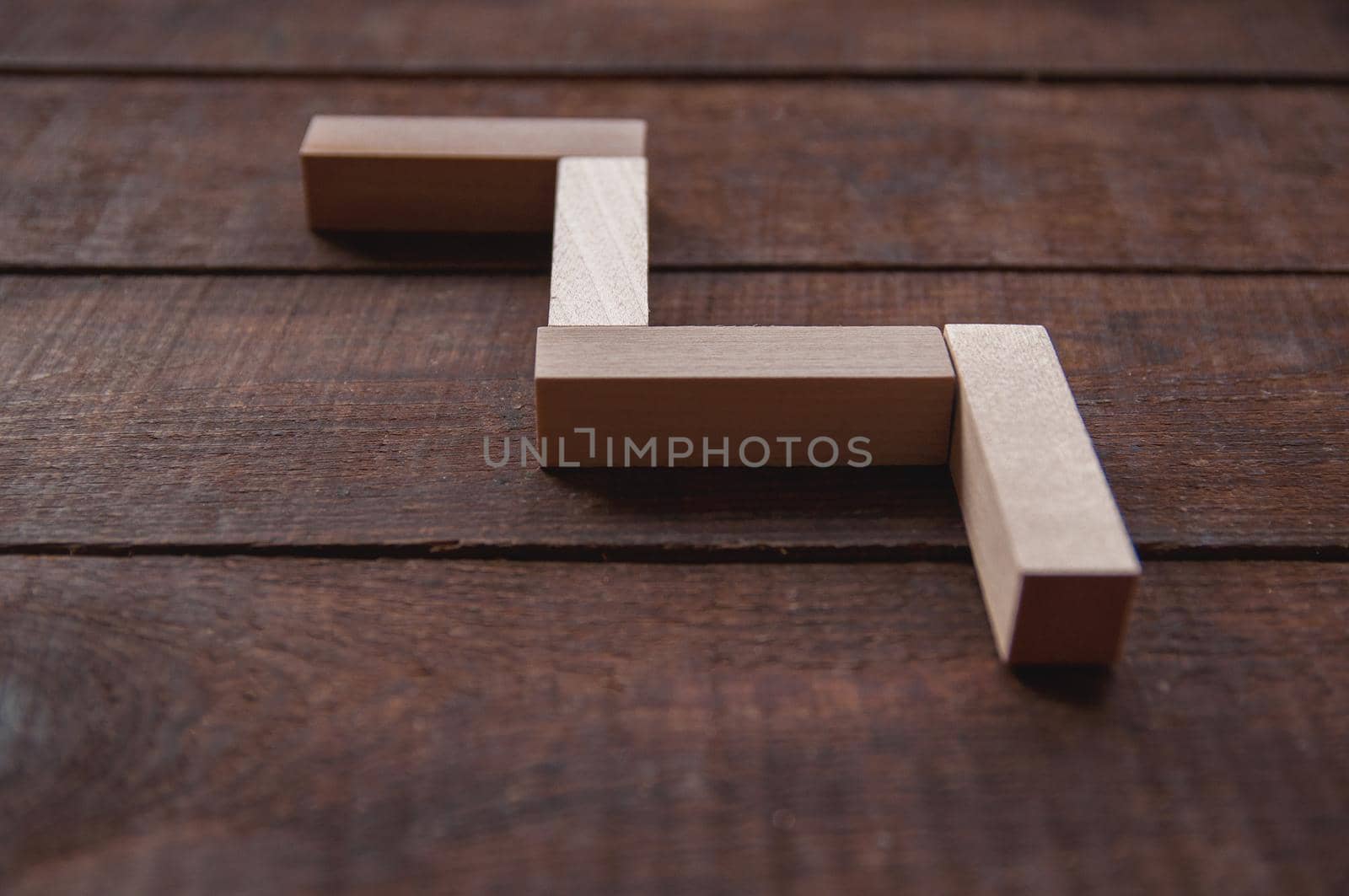 background wooden brown there are laid out wooden rectangles, arranged in a certain order in the style of minimalism