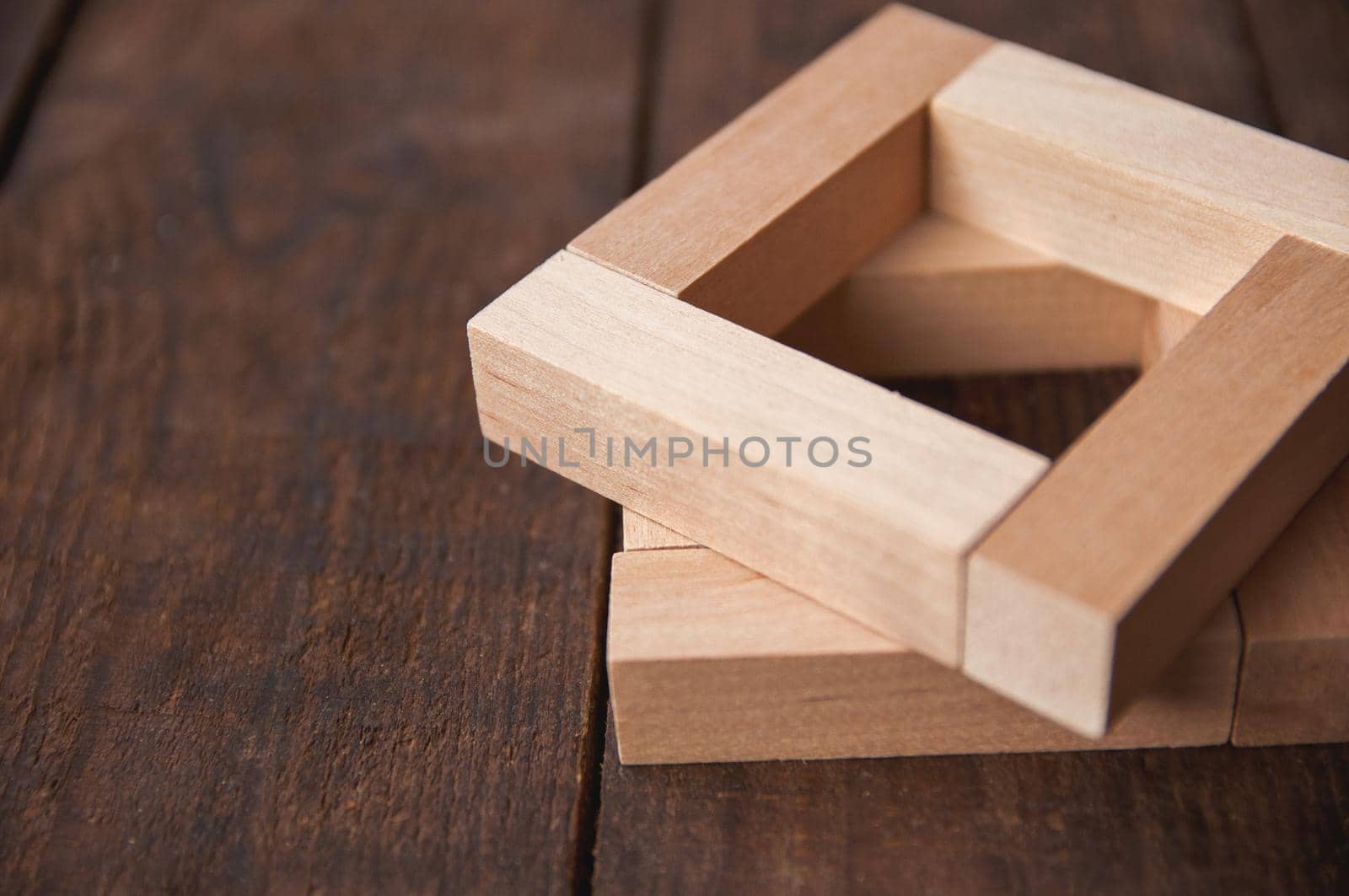 background wooden brown there are laid out wooden rectangles by ozornina