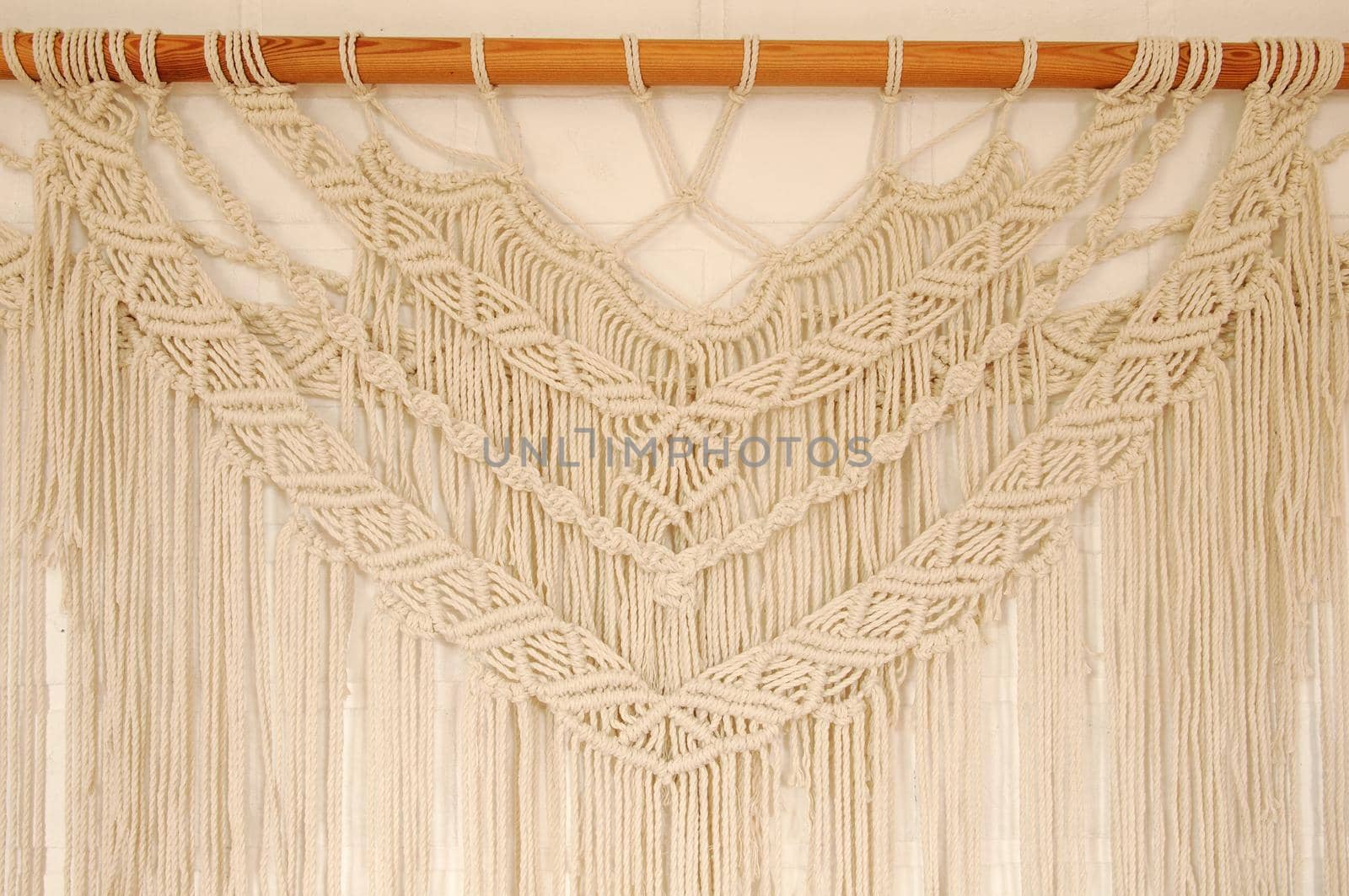 Macrame pattern. A minimal, stylish, trendy concept with a beautiful background by ozornina