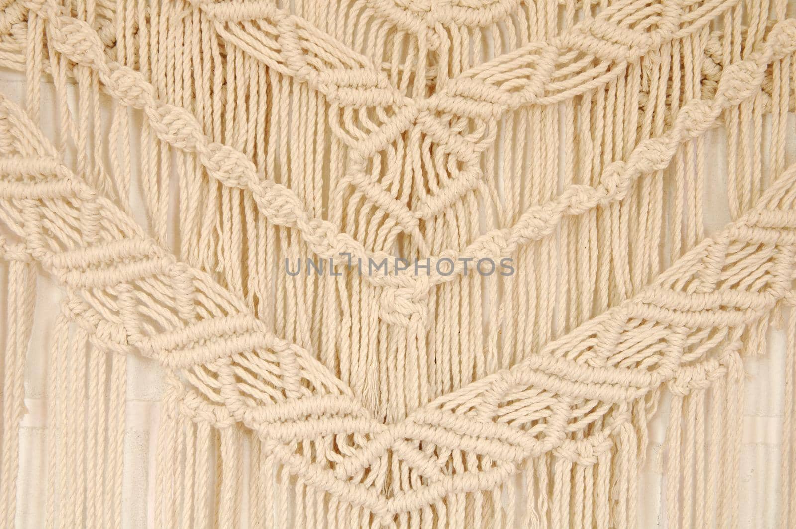 Macrame pattern. A minimal, stylish, trendy concept with a beautiful background by ozornina